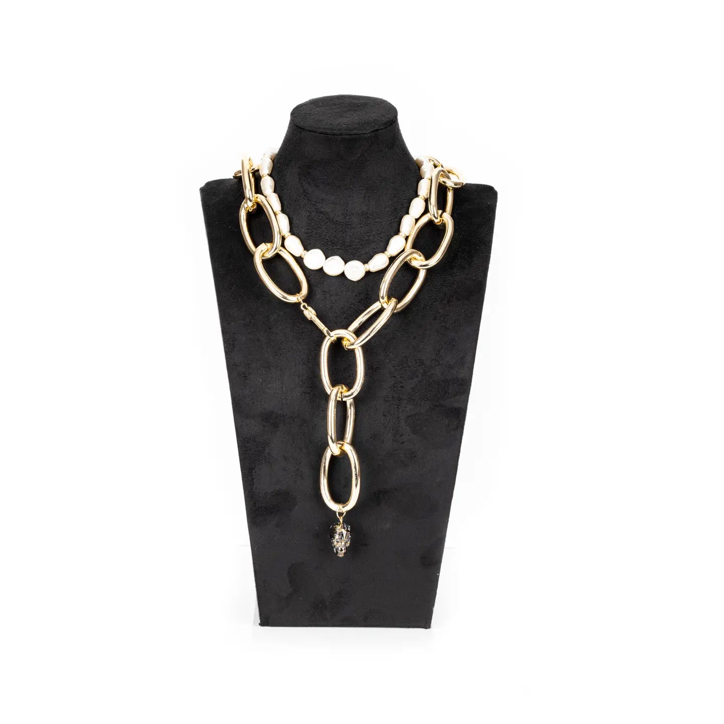 Gold oversized chain necklace with pearl accent and crystal drop pendant on white background.
