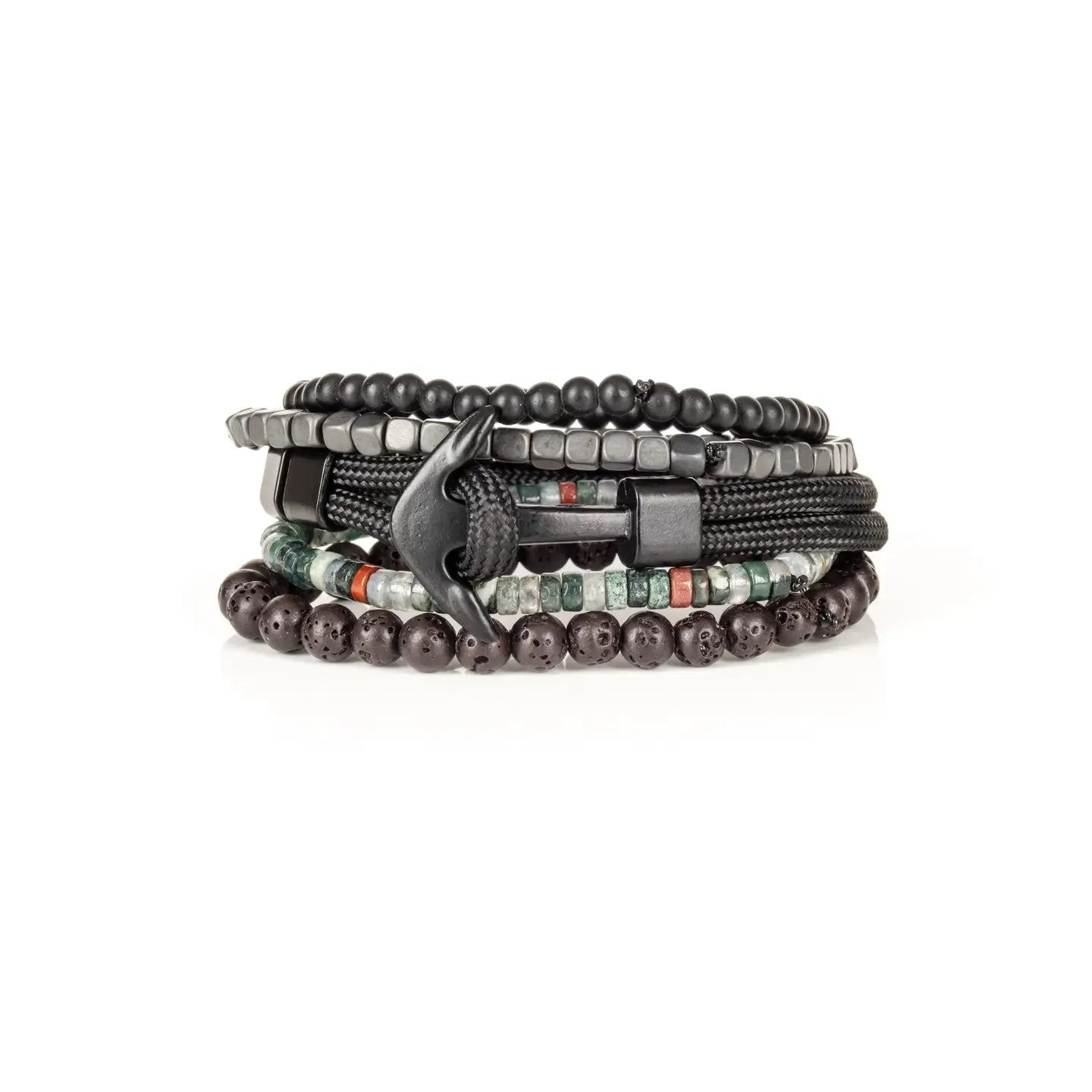 Men’s layered bracelet set featuring matte black bead strands, gunmetal cube beads, black braided cord wraps, dark lava stone beads, and green natural stone accent beads with subtle earth-tone details, stacked in a rugged contemporary luxury design on a white background.
