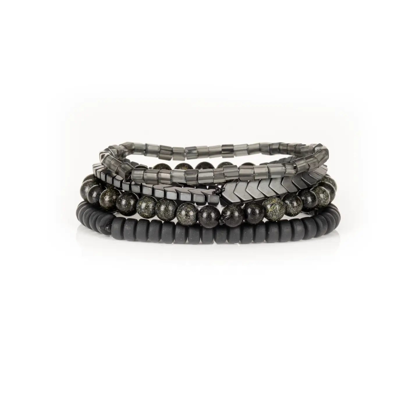 Men’s layered bracelet set featuring gunmetal chevron metal beads, smoky gray translucent beads, black matte heishi beads, and dark gray natural stone beads with subtle metallic shimmer, stacked in a sophisticated monochromatic luxury design on a white background.
