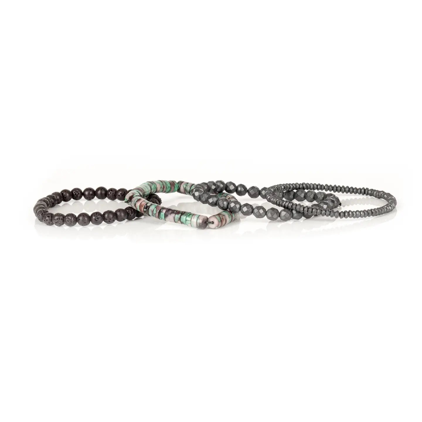 Men's layered bracelet set featuring faceted hematite beads, matte black lava stone beads, and natural heishi stone beads in turquoise, cream, mauve, and earthy brown tones arranged in a stacked design on a white background.