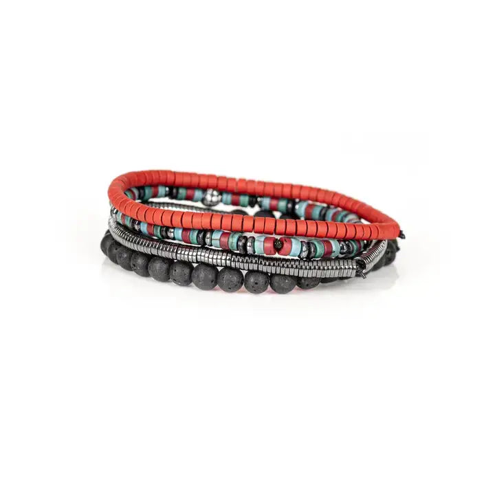 Men's layered bracelet set featuring coral red heishi beads, turquoise and black accent beads, silver-tone hematite spacers, a decorative pavé-style centerpiece bead, and matte black lava stone beads arranged in a stacked design on a white background.