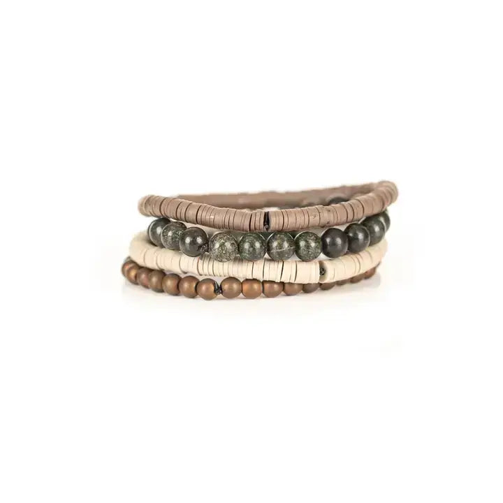 Earth-tone multi-layer men’s bracelet set featuring natural stone beads, matte beige disc beads, bronze bead strand, and layered neutral textures on a light background.