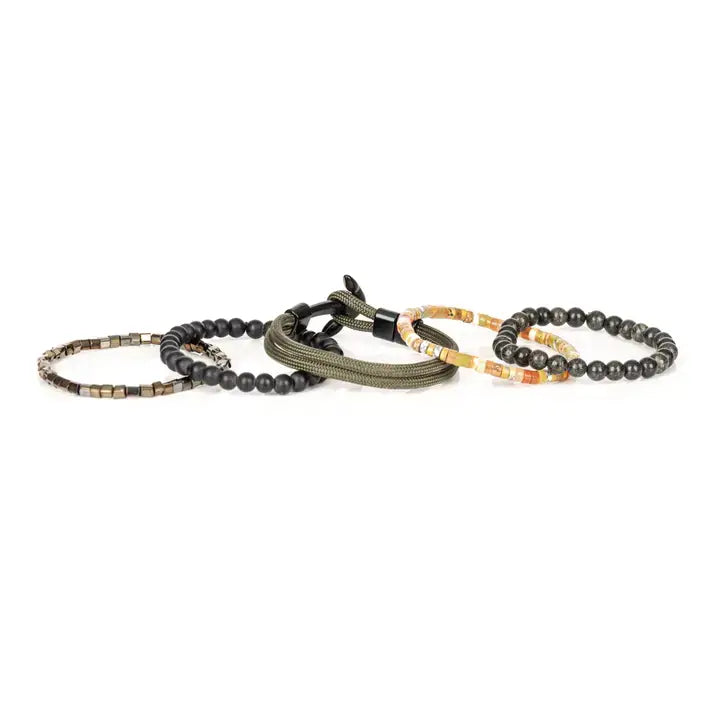 Men’s layered bracelet set featuring black natural stone beads, matte black onyx-style beads, multicolor heishi beads in warm earth tones, olive braided cord wraps, and metallic hematite spacer beads, stacked in a contemporary bohemian luxury design on a white background.