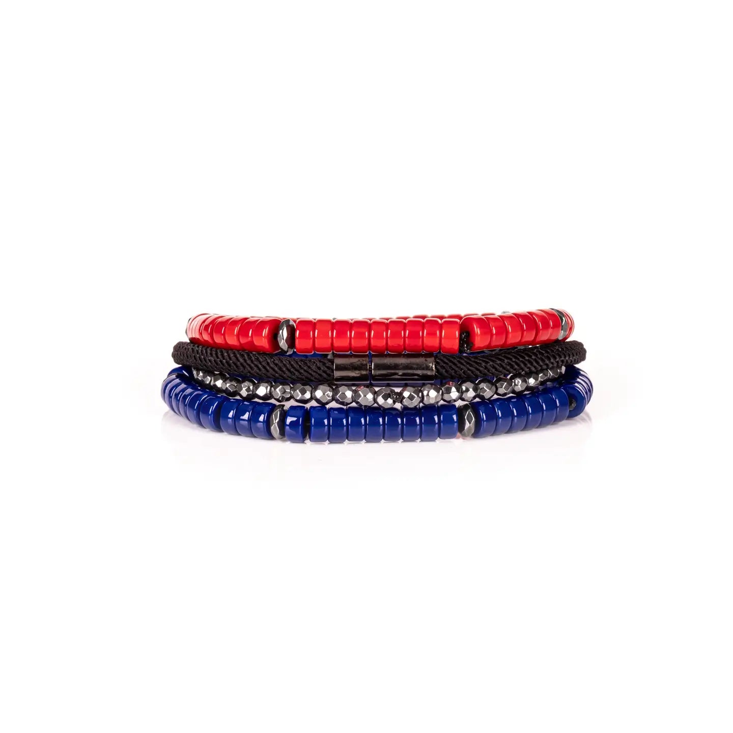 Men’s layered bracelet set featuring vibrant red and royal blue heishi beads, black braided cord, faceted hematite crystal beads, and gunmetal spacer accents, stacked in a bold contemporary luxury design on a white background.