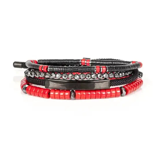 Men’s layered bracelet set featuring black and red heishi beads, faceted hematite crystal beads, black braided cord, a gunmetal ID bar centerpiece, and black accent beads, stacked in a bold contemporary luxury design on a white background.
