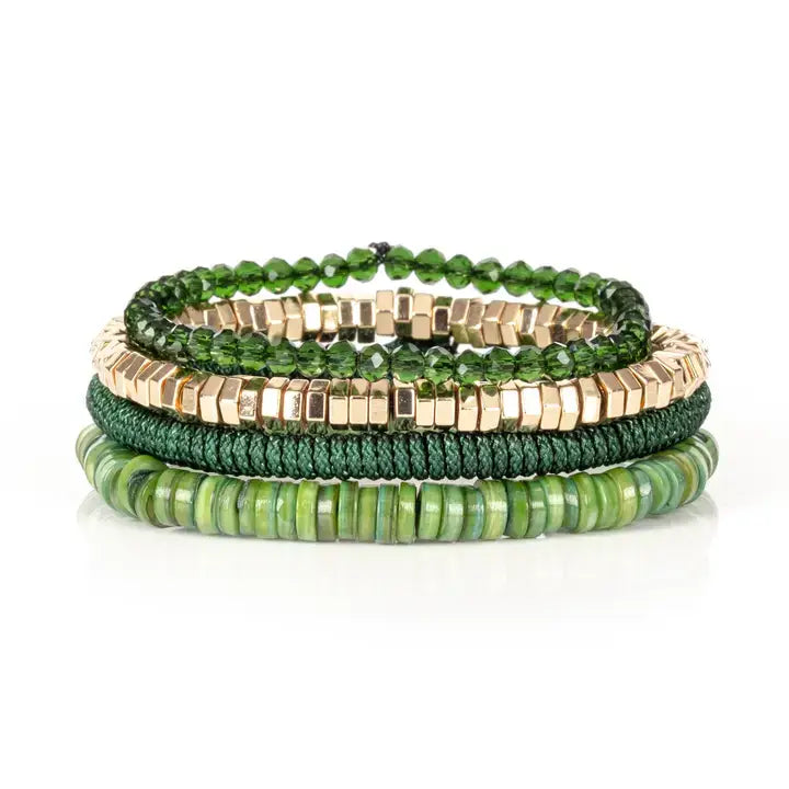 Green multi-layer men’s bracelet set featuring faceted green crystal beads, gold hematite cube beads, braided green rope, and layered green natural stone disc beads on a light background.
