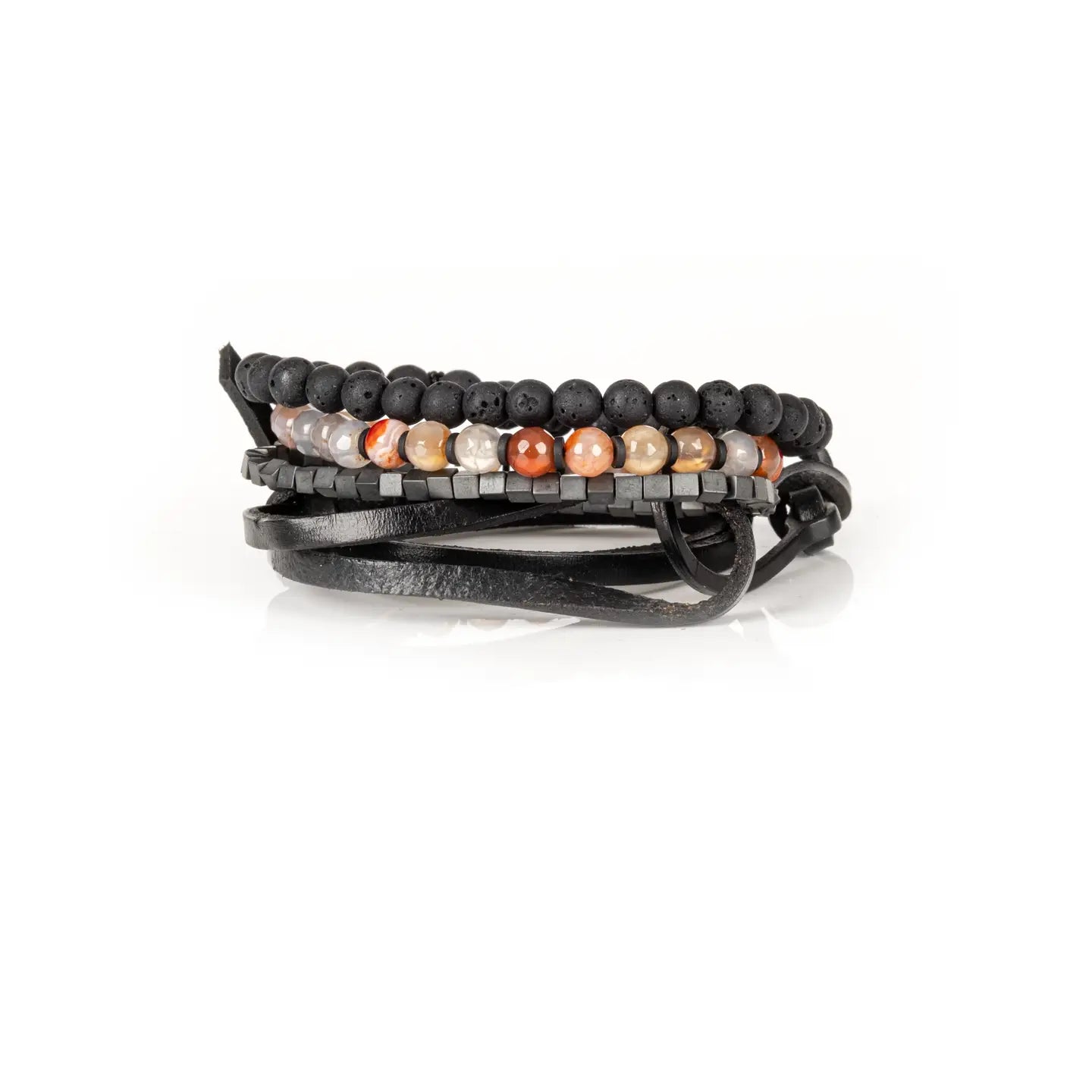 Men's layered bracelet set featuring matte black lava stone beads, faceted brown and cream agate gemstone beads, dark hematite cube beads, and black leather wrap straps arranged in a handcrafted stacked design on a white background.