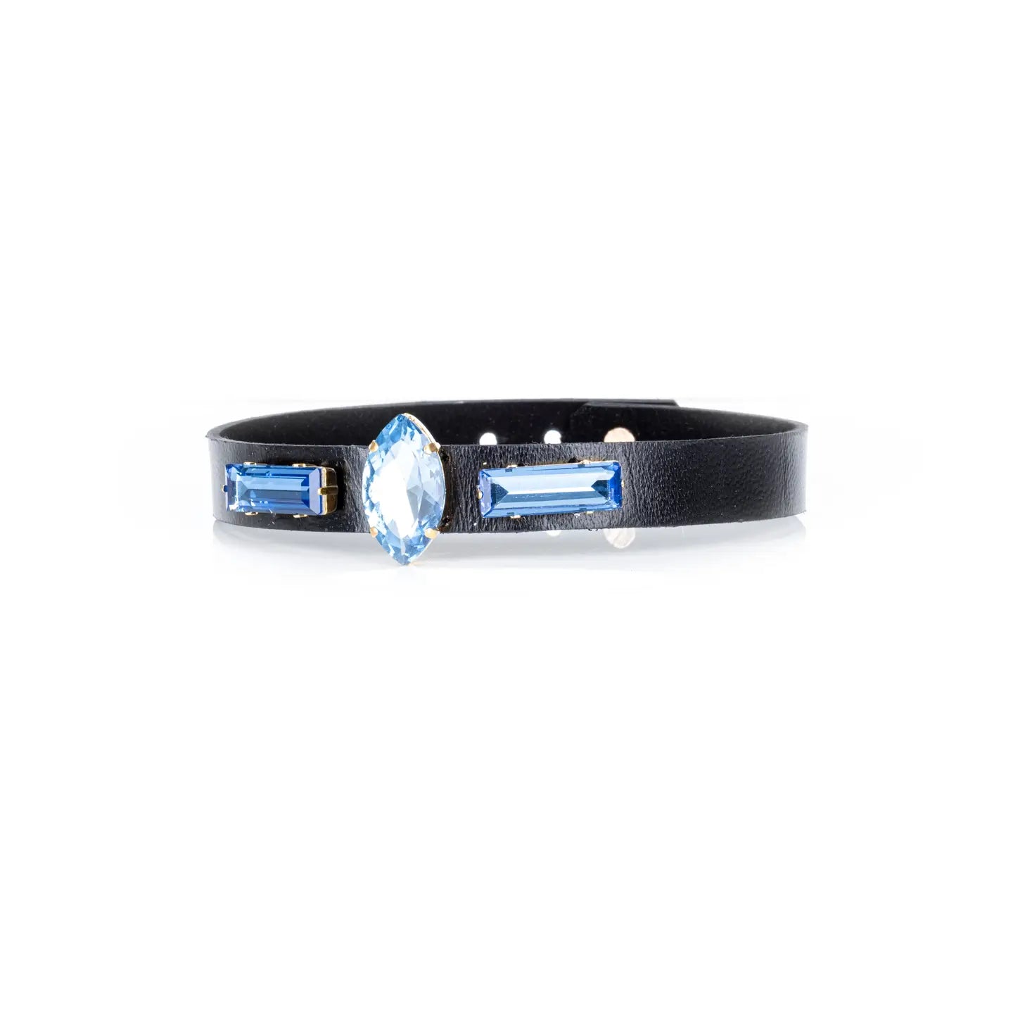 Black leather choker with a central marquise-cut blue crystal and two side baguette blue crystals, displayed on a white background.