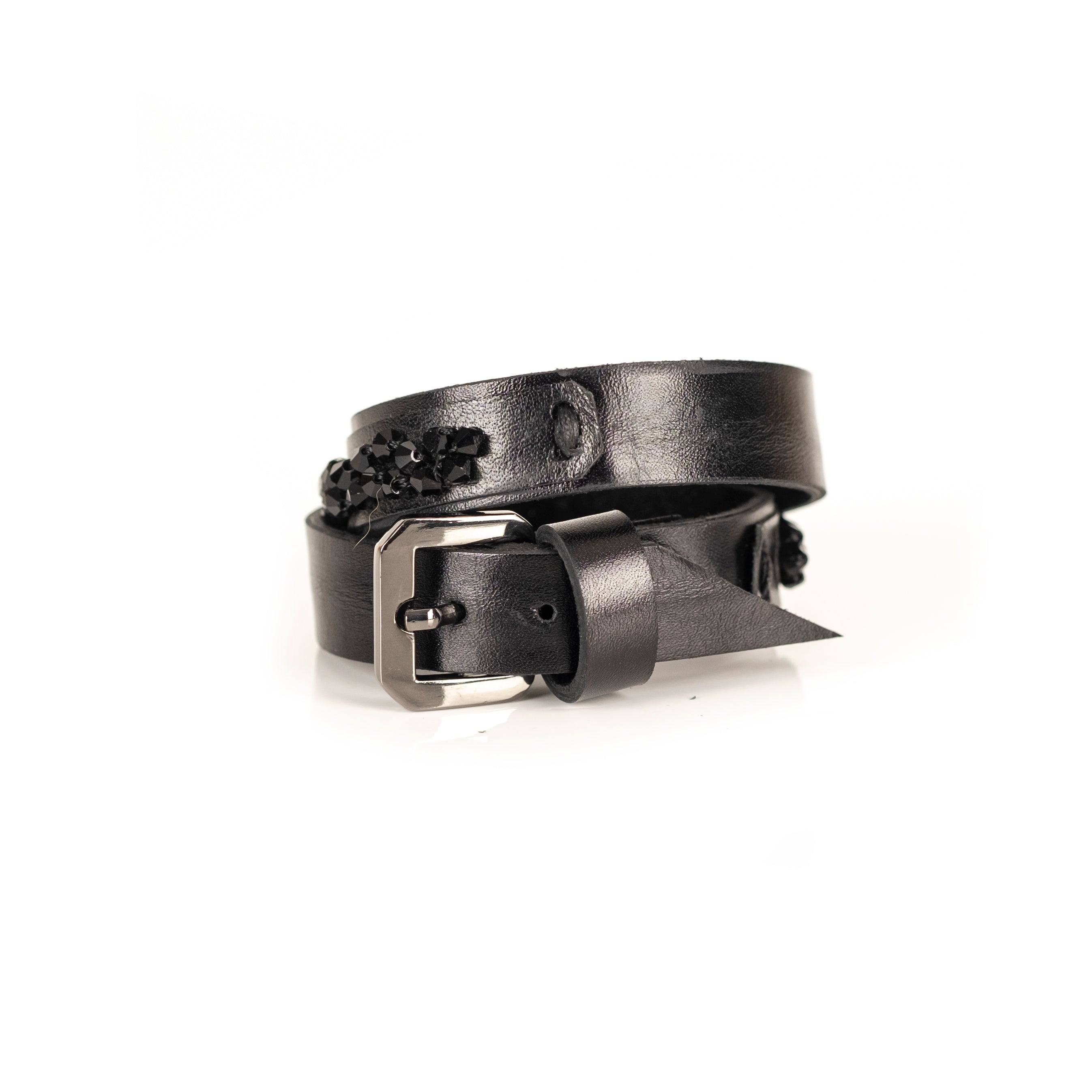 Minimalist black leather bracelet with faceted black crystal edge and buckle closure, handmade by THE DARK