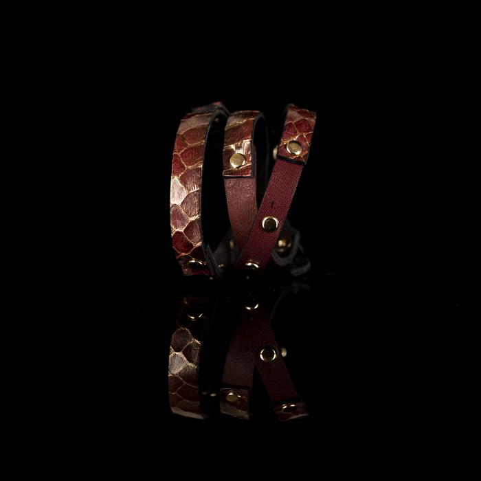 Layered burgundy leather choker with python texture and gold rivet detailing