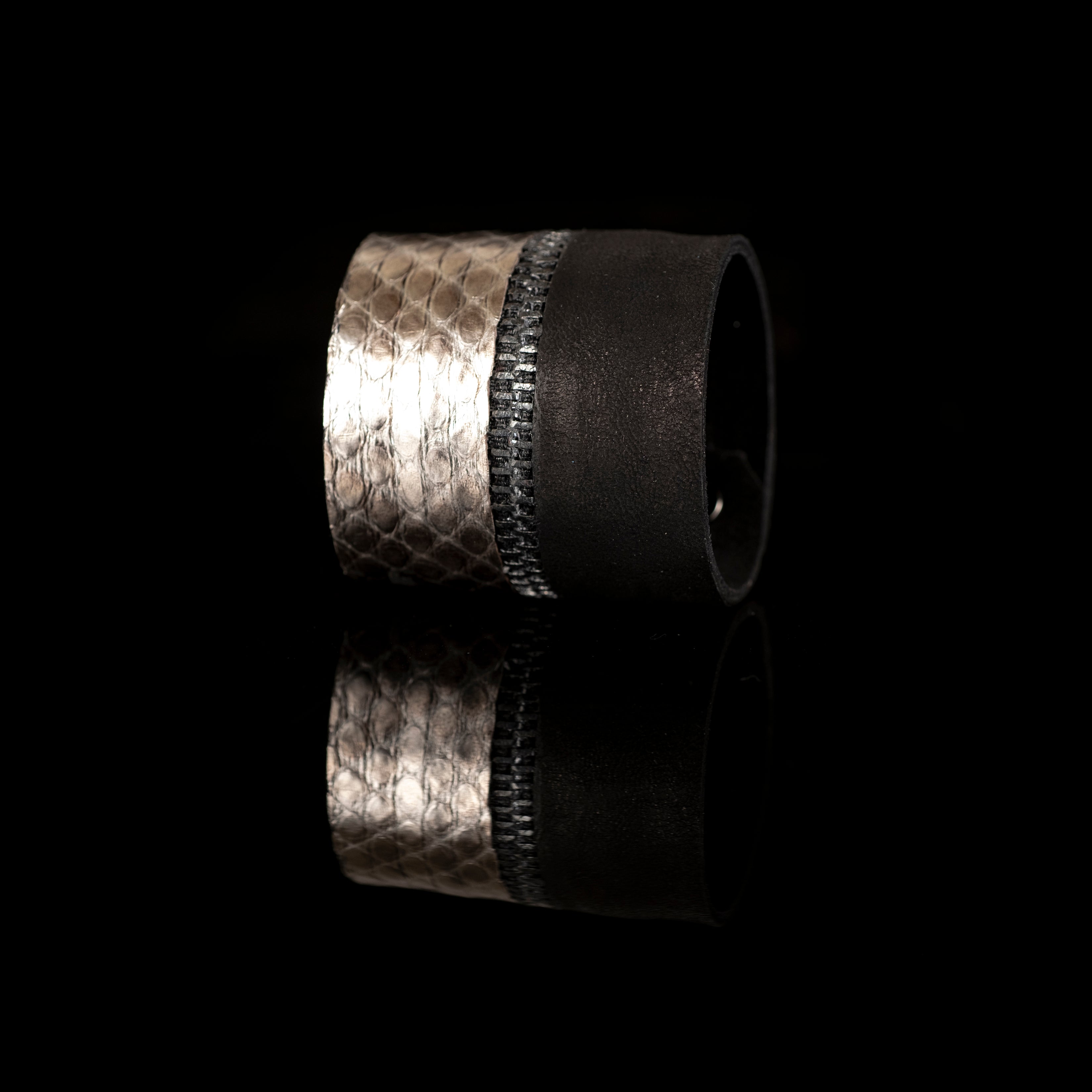 Black leather cuff with metallic python leather panel and zipper detail, handmade statement bracelet by THE DARK