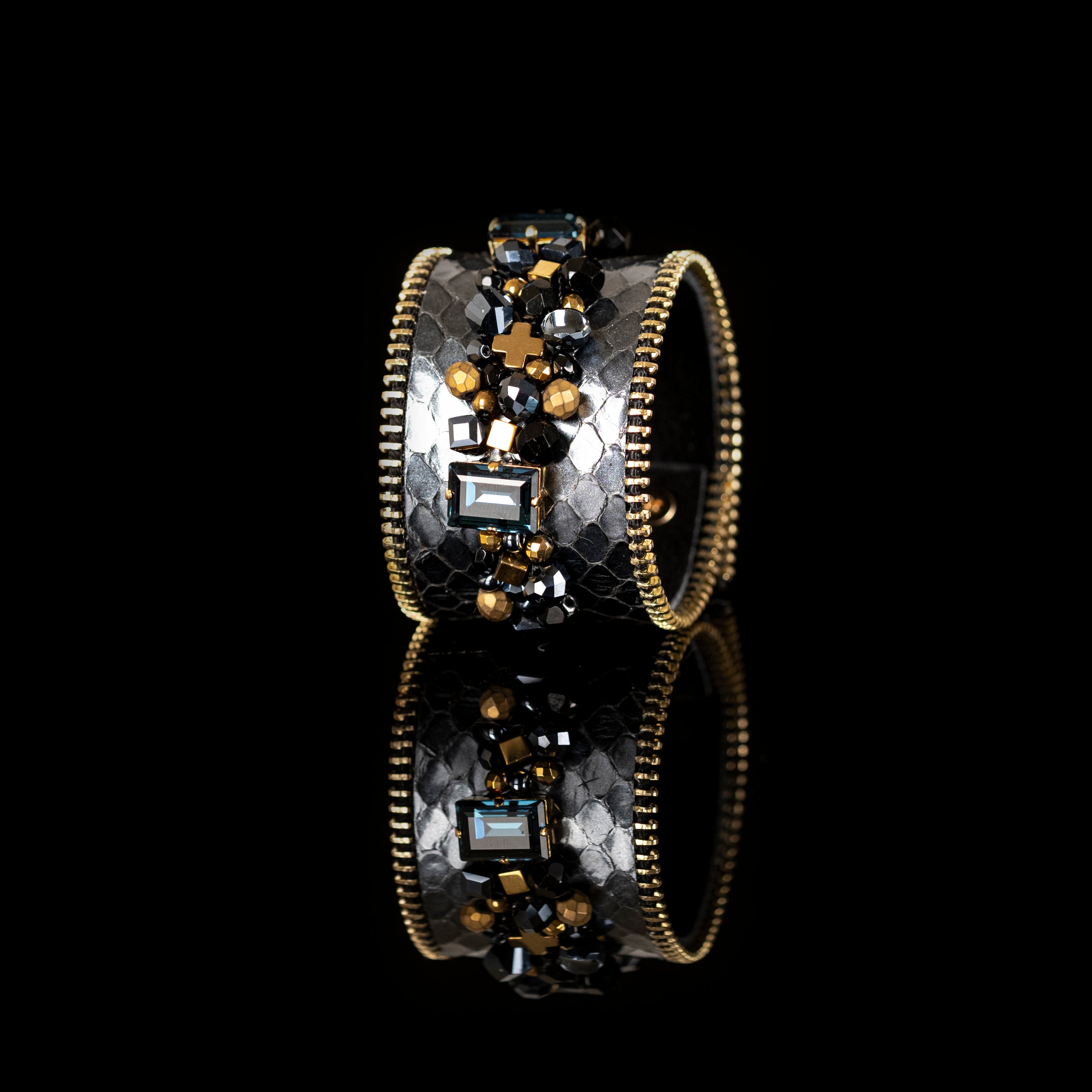 Grey python leather cuff bracelet with crystal and black gold bead embellishment and zipper edges, handmade statement cuff by THE DARK