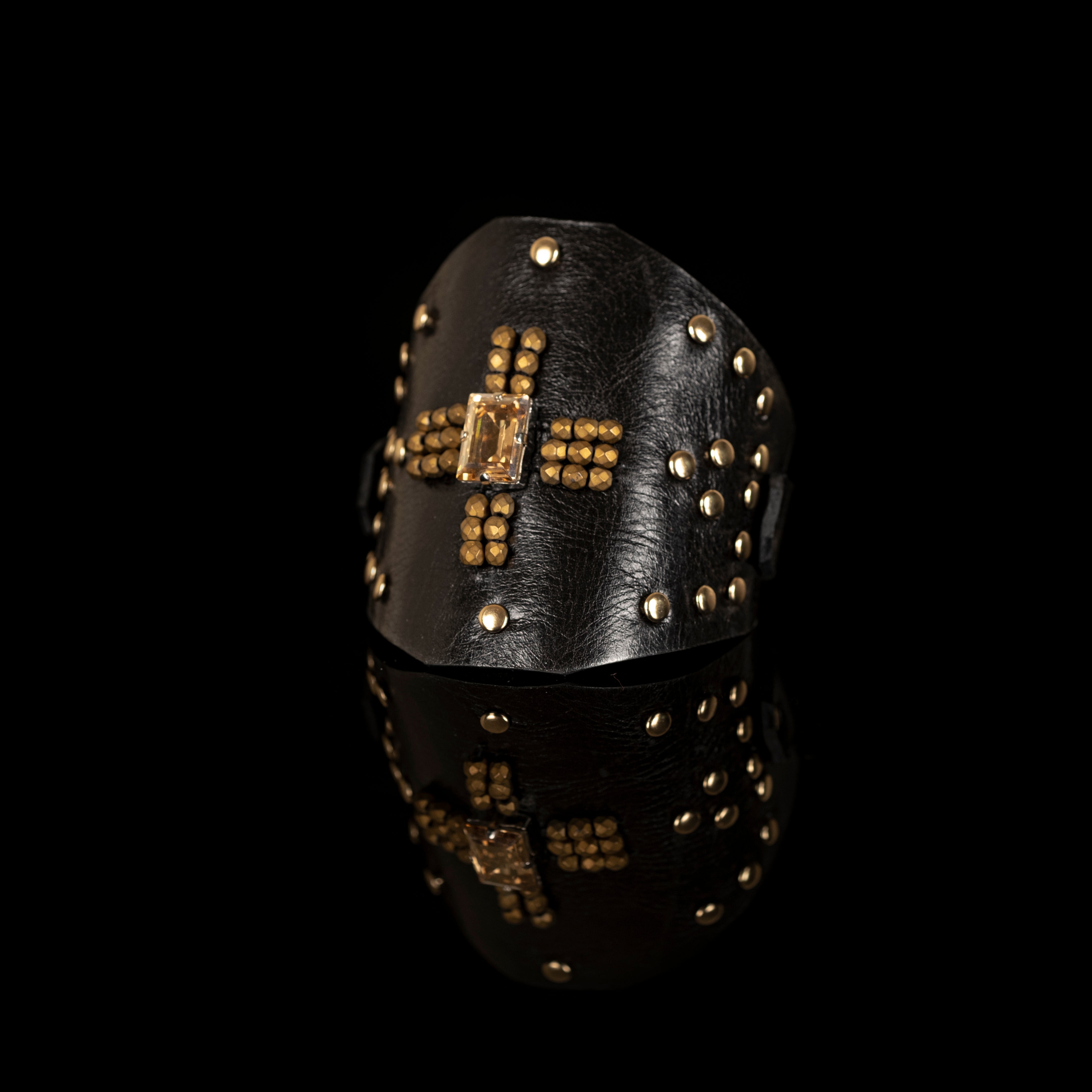 Black leather cuff bracelet with gold studded cross and crystal centerpiece, handmade statement bracelet by THE DARK