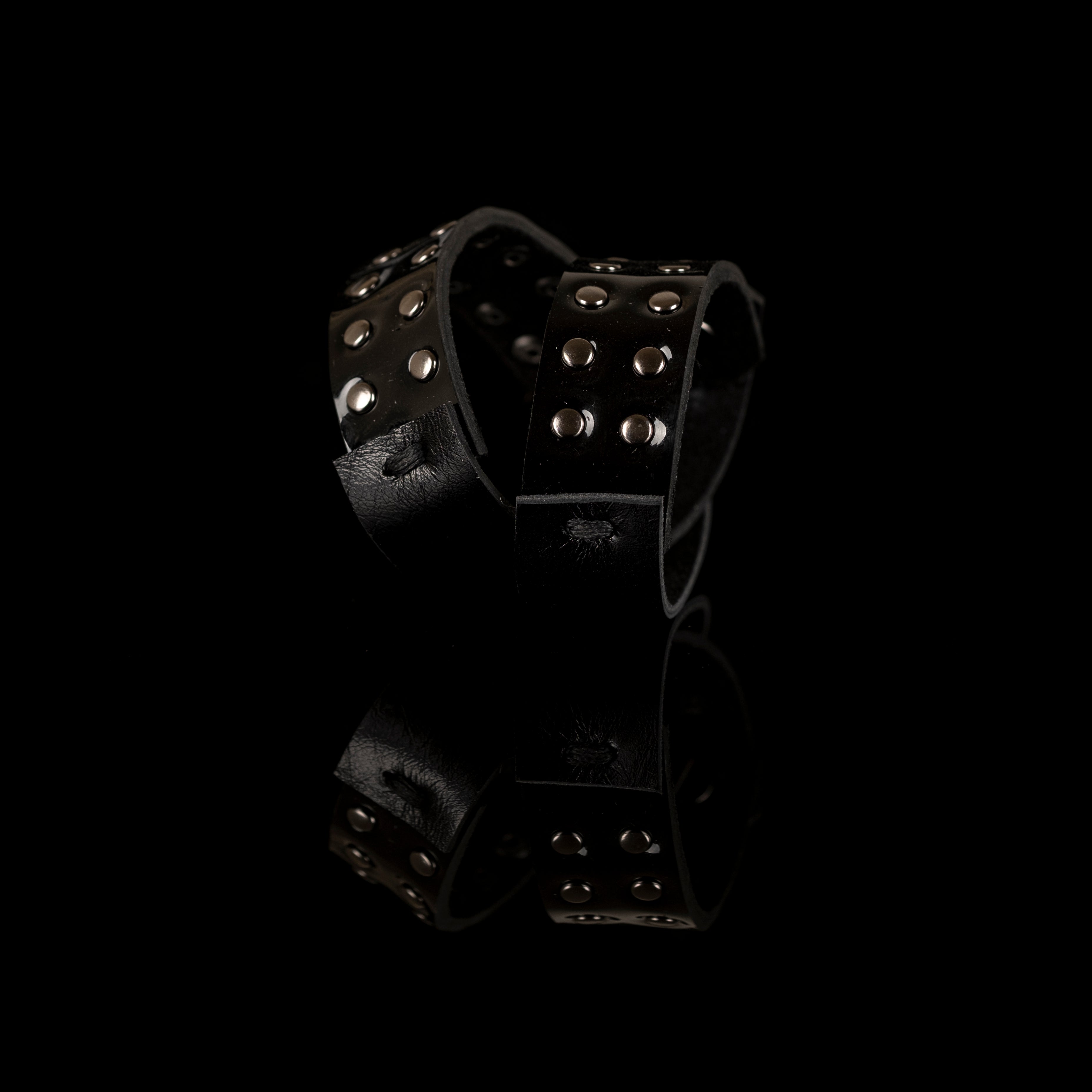 Black double strap leather bracelet with round metal studs, handmade minimalist statement bracelet by THE DARK