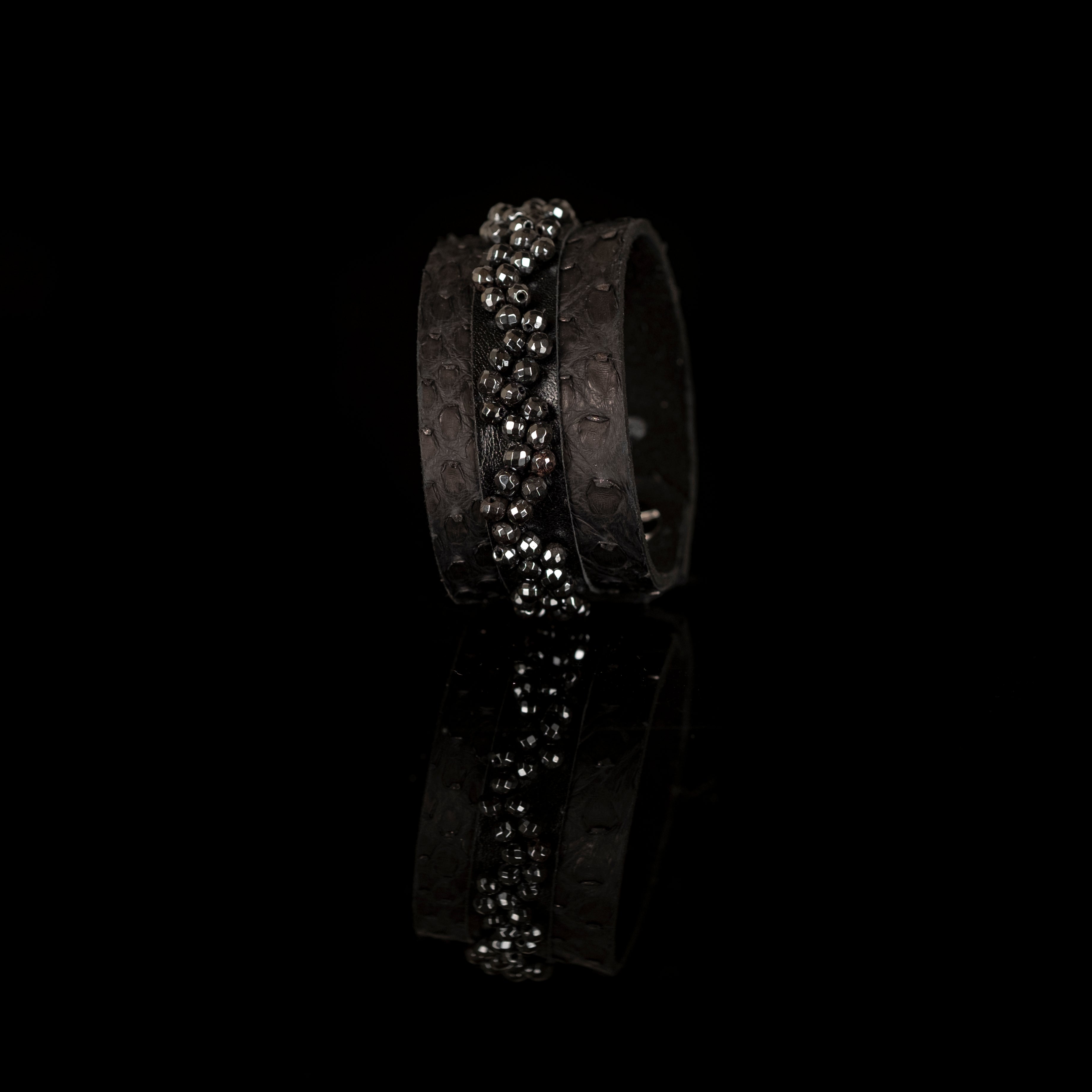 Black python texture leather bracelet with metallic bead strands, handmade statement cuff by THE DARK