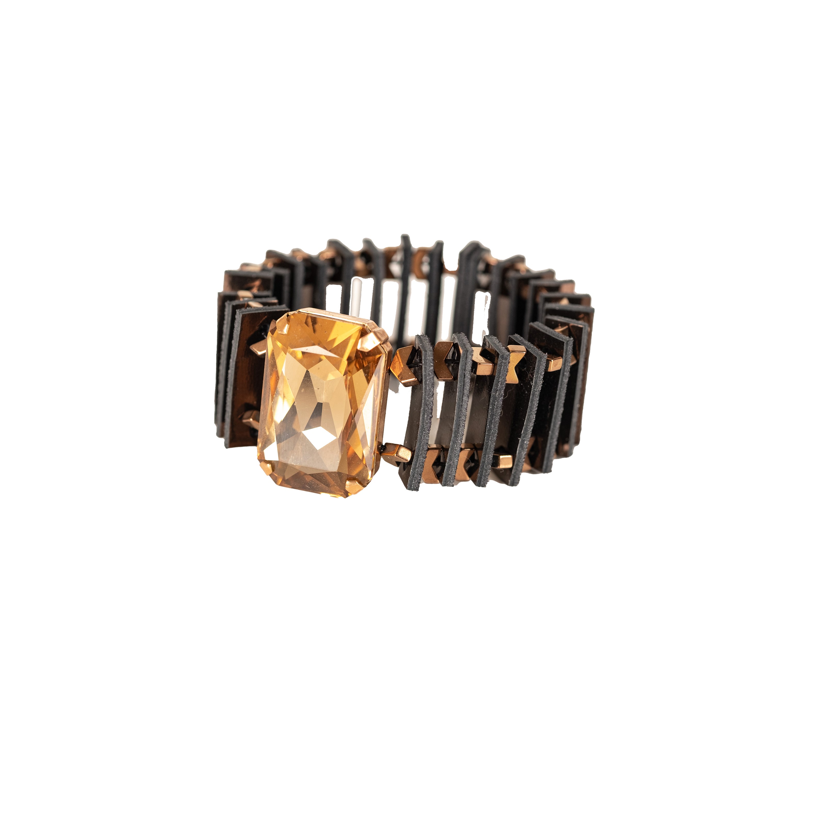 Black architectural leather cuff bracelet with large amber crystal centerpiece, handmade statement bracelet by THE DARK.