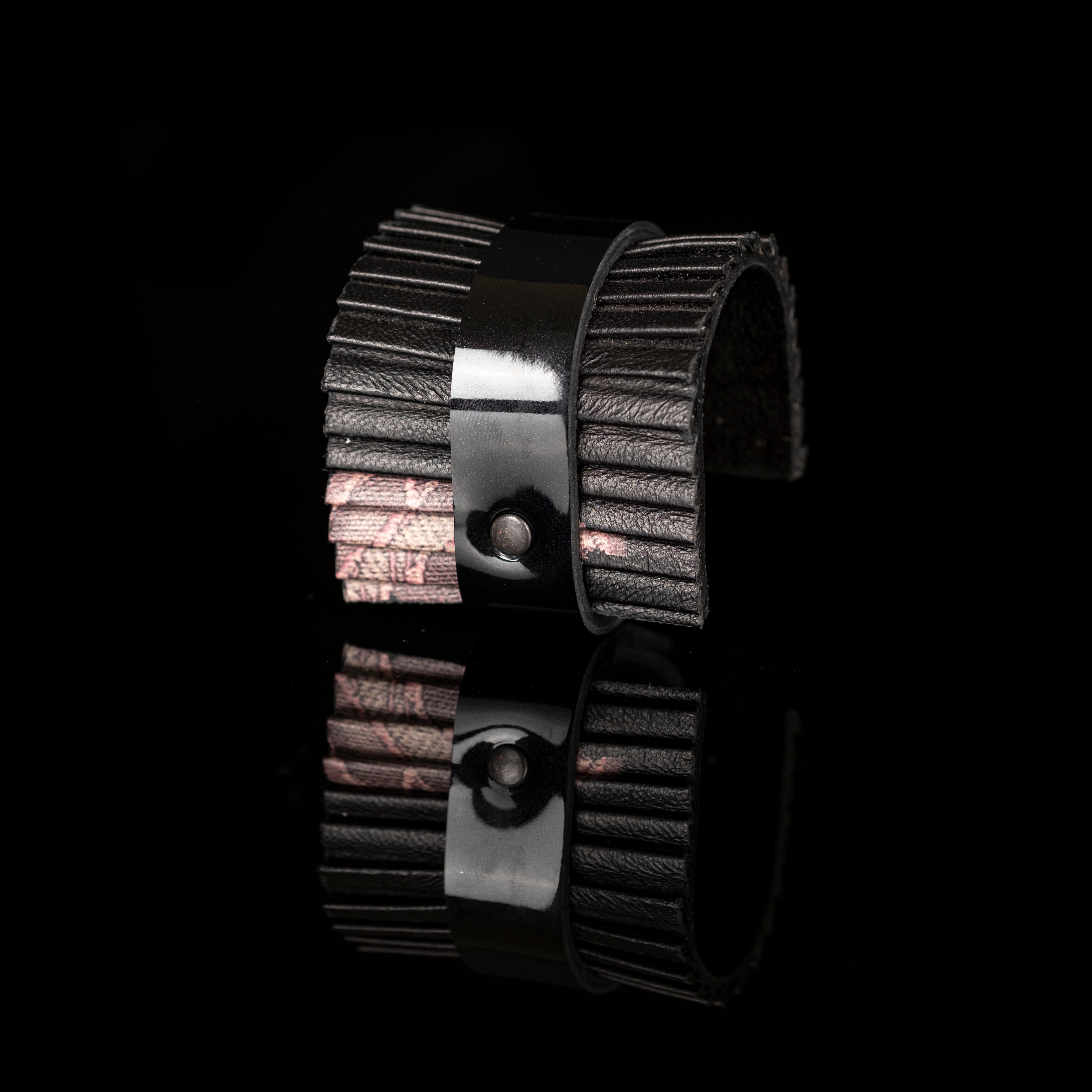 Black pleated leather cuff bracelet with layered textured panels, handmade architectural statement bracelet by THE DARK