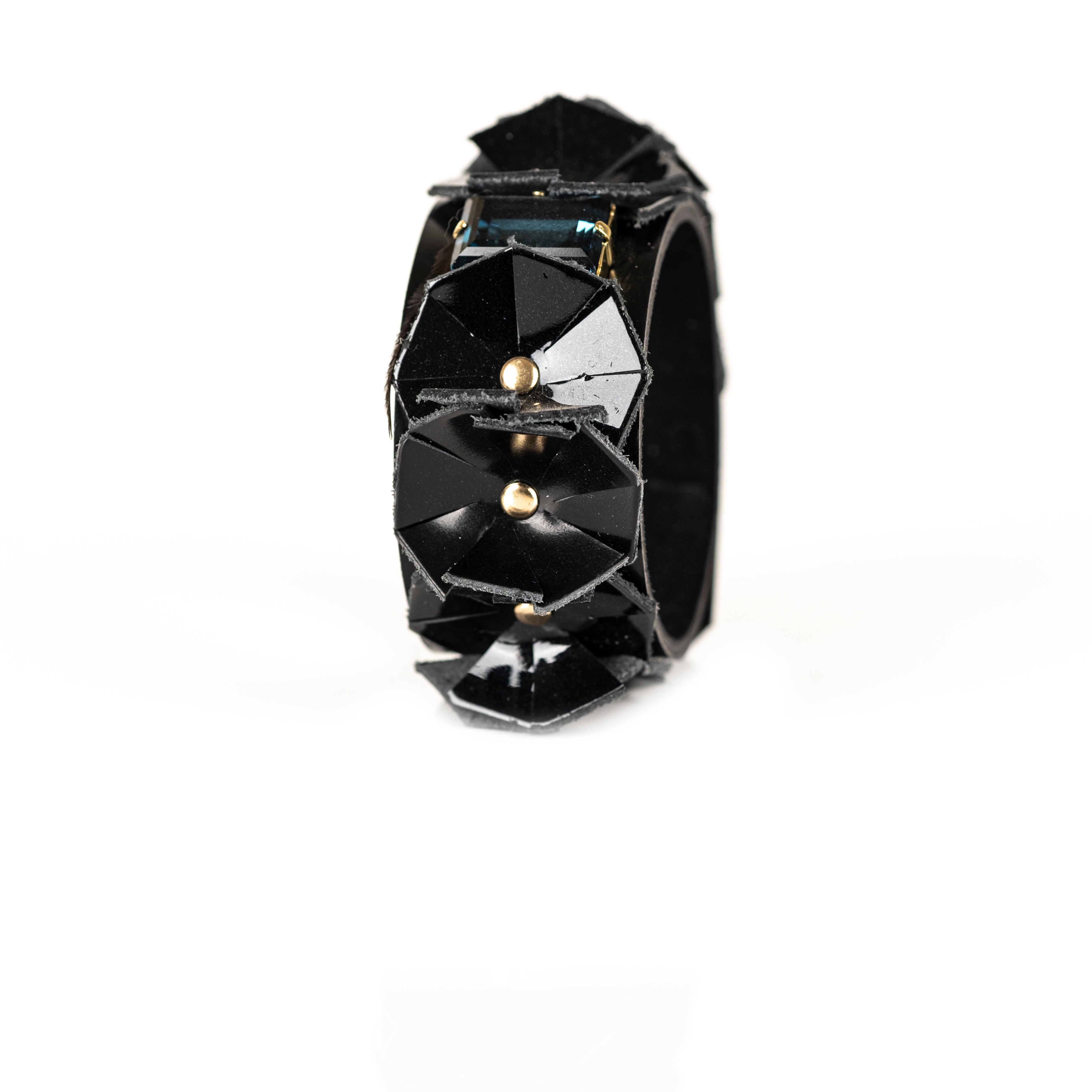 Black faceted leather cuff bracelet with geometric panels and crystal centerpiece, handmade statement bracelet by THE DARK