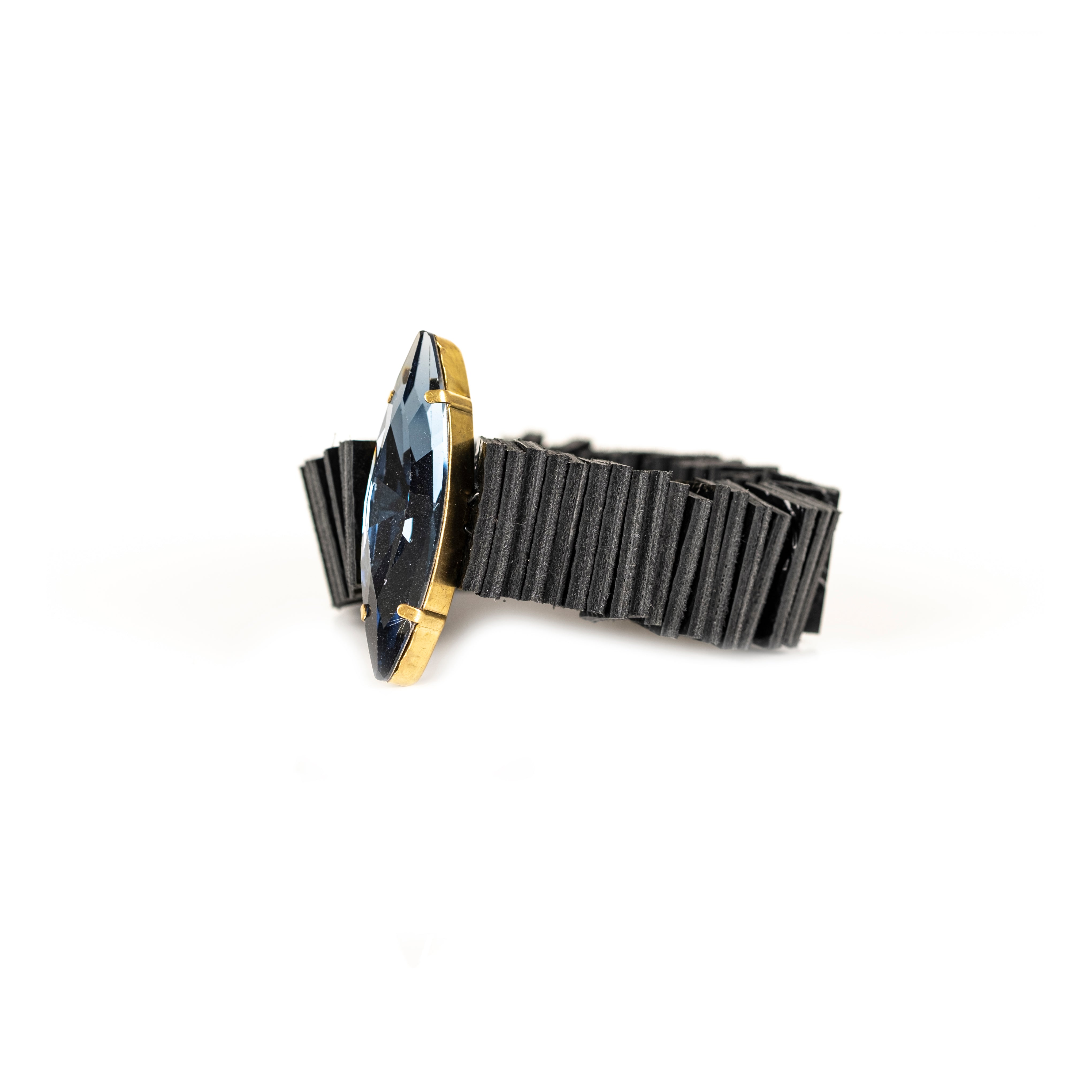 Black layered fringe leather bracelet with marquise crystal centerpiece and gold setting, handmade statement cuff by THE DARK