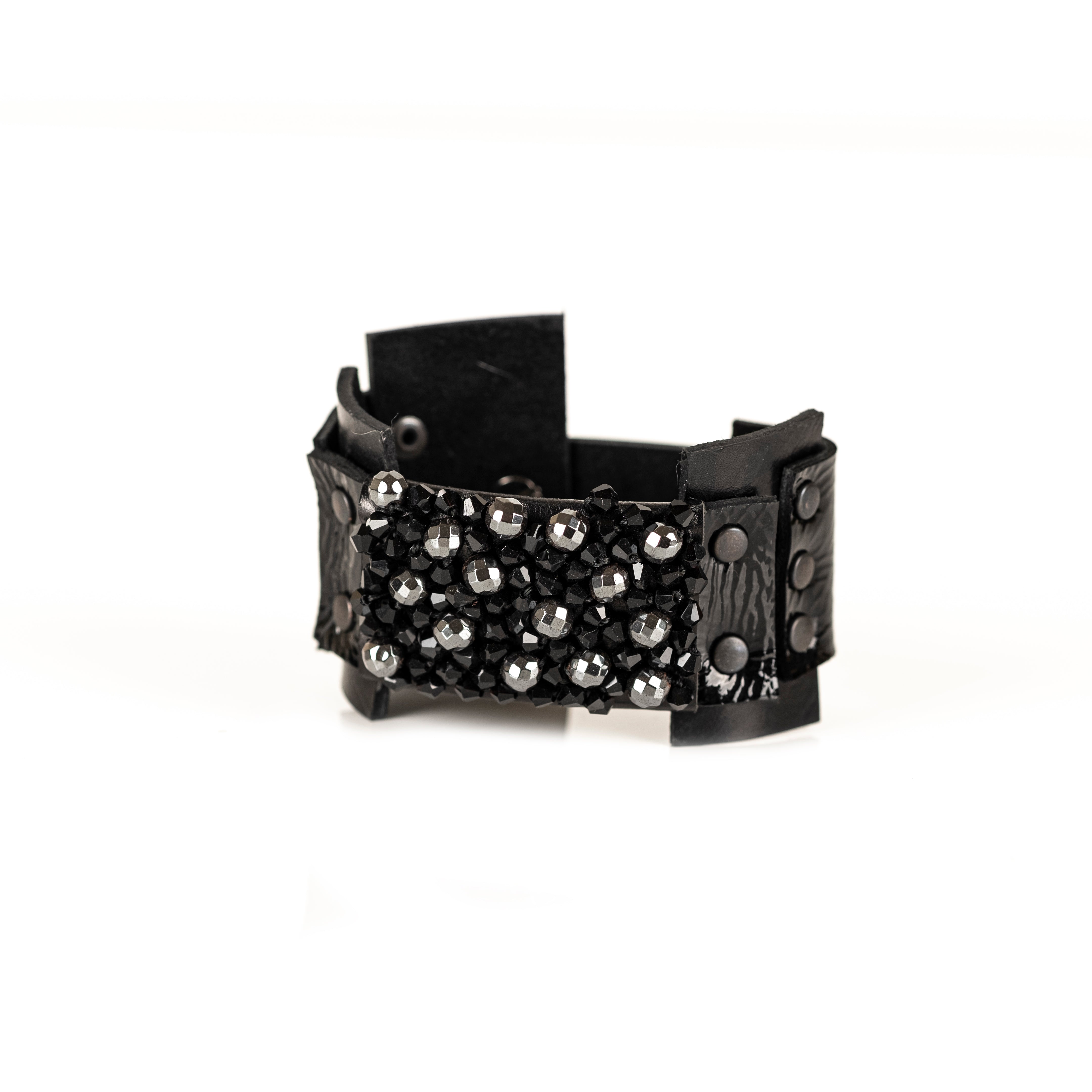 Black leather cuff bracelet with dense black crystal cluster and studded leather panels, handmade statement bracelet by THE DARK