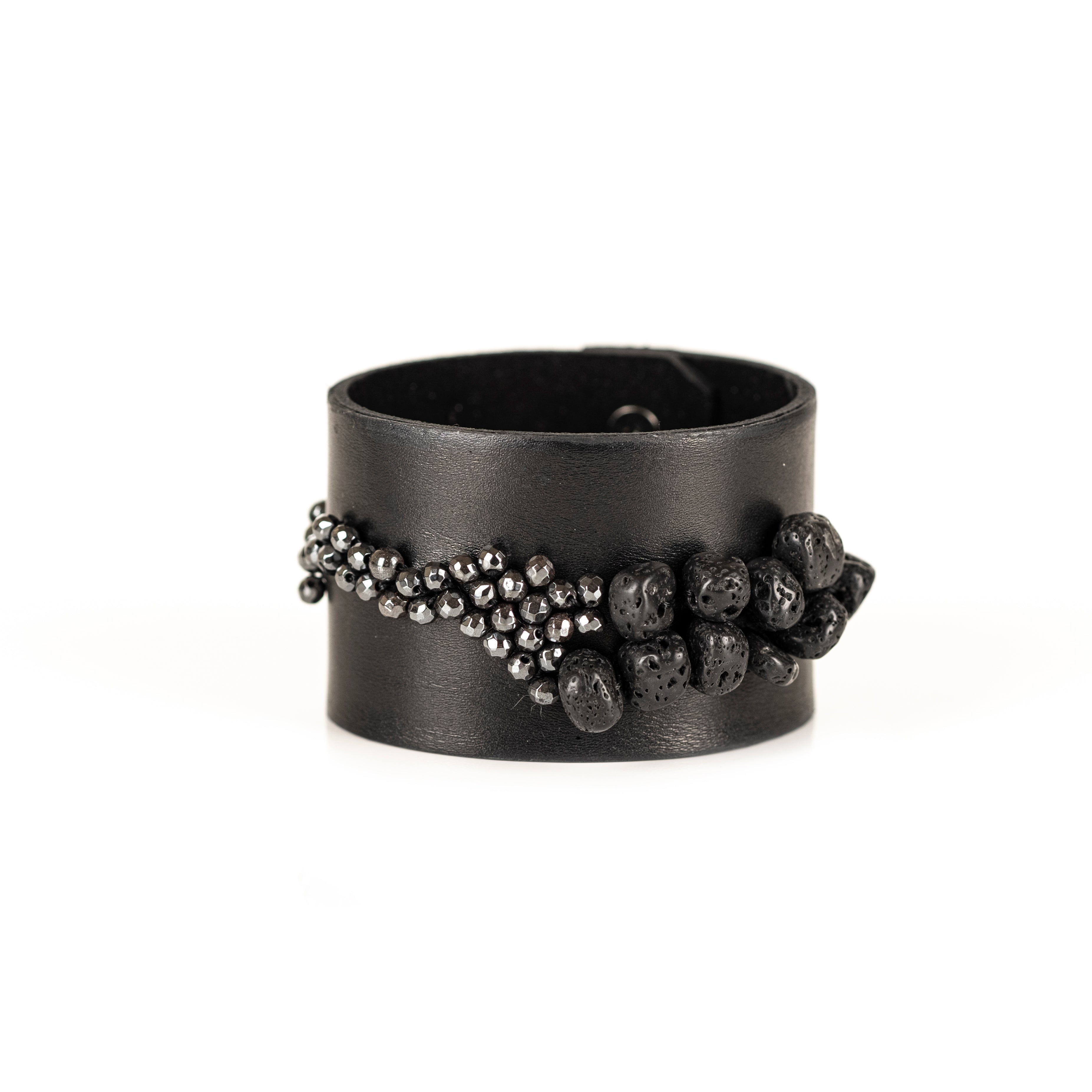 Black leather cuff bracelet with cascading metallic bead and lava stone detail, handmade statement bracelet by THE DARK