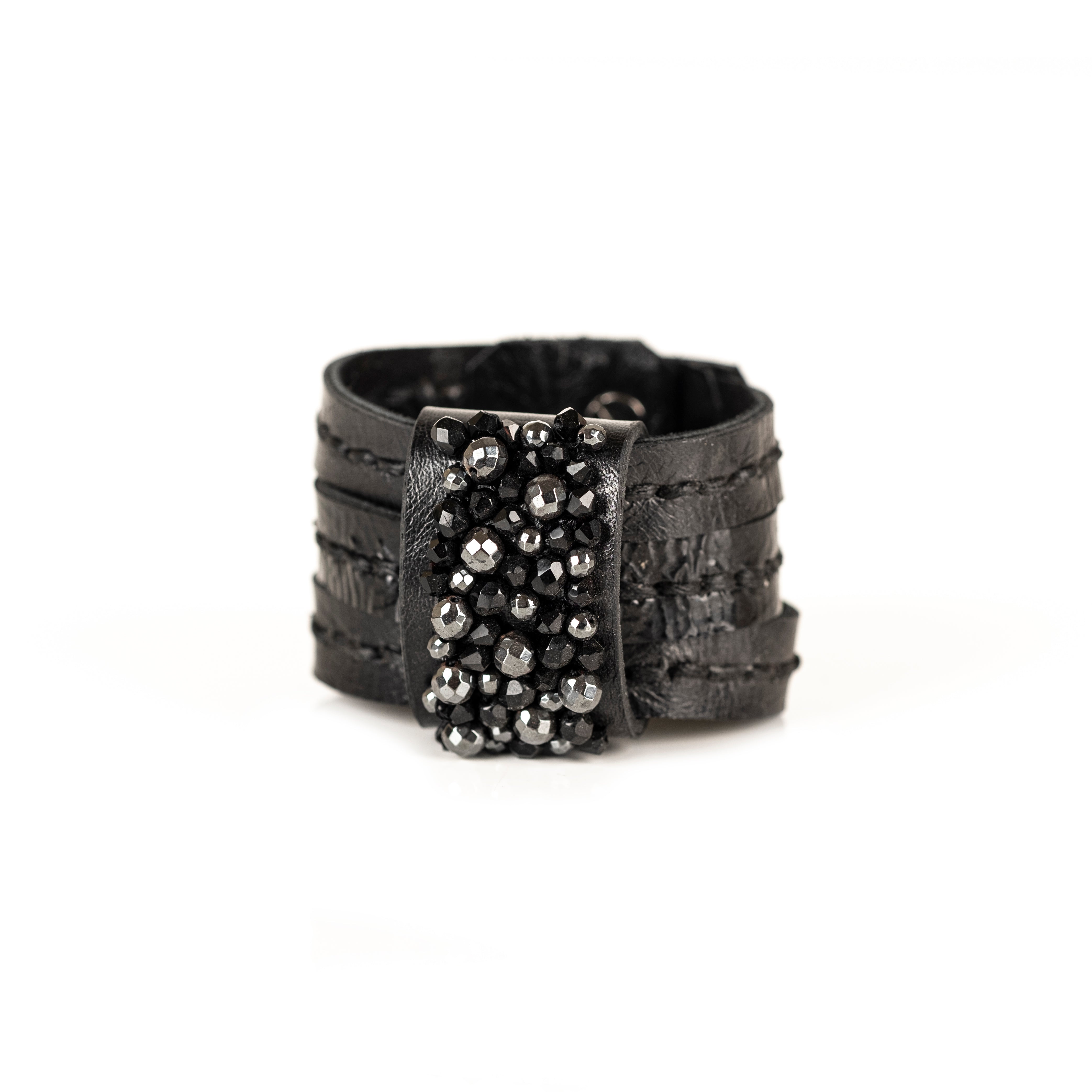 Black leather cuff bracelet with dense black crystal crown and layered textured leather bands, handmade bracelet by THE DARK