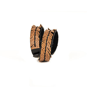 Tan leather wrap bracelet with feather textured pattern and braided center detail, handmade bracelet by THE DARK