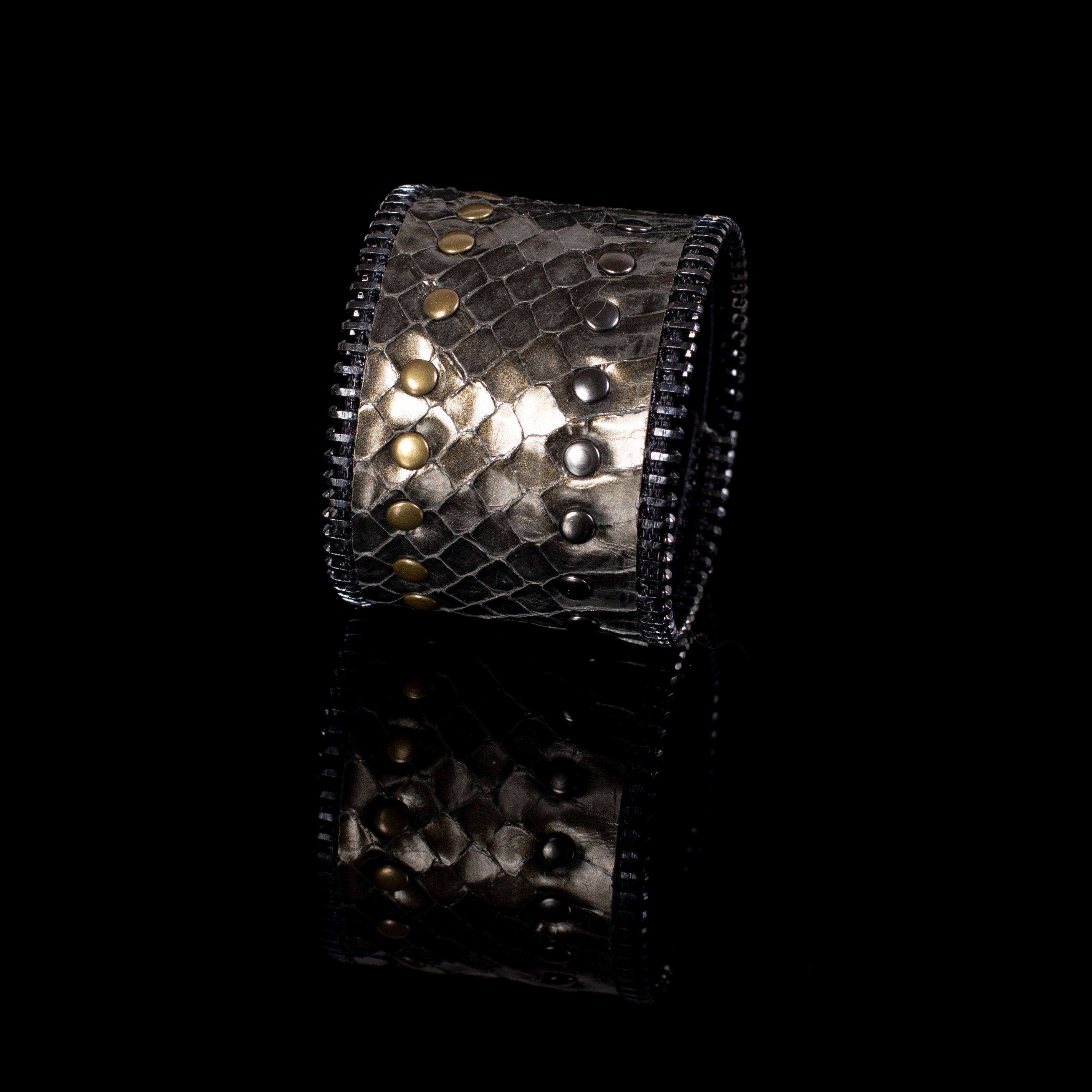 Gold python leather cuff bracelet with mixed metal studs and zipper edge detail, handcrafted wide luxury statement bracelet for women