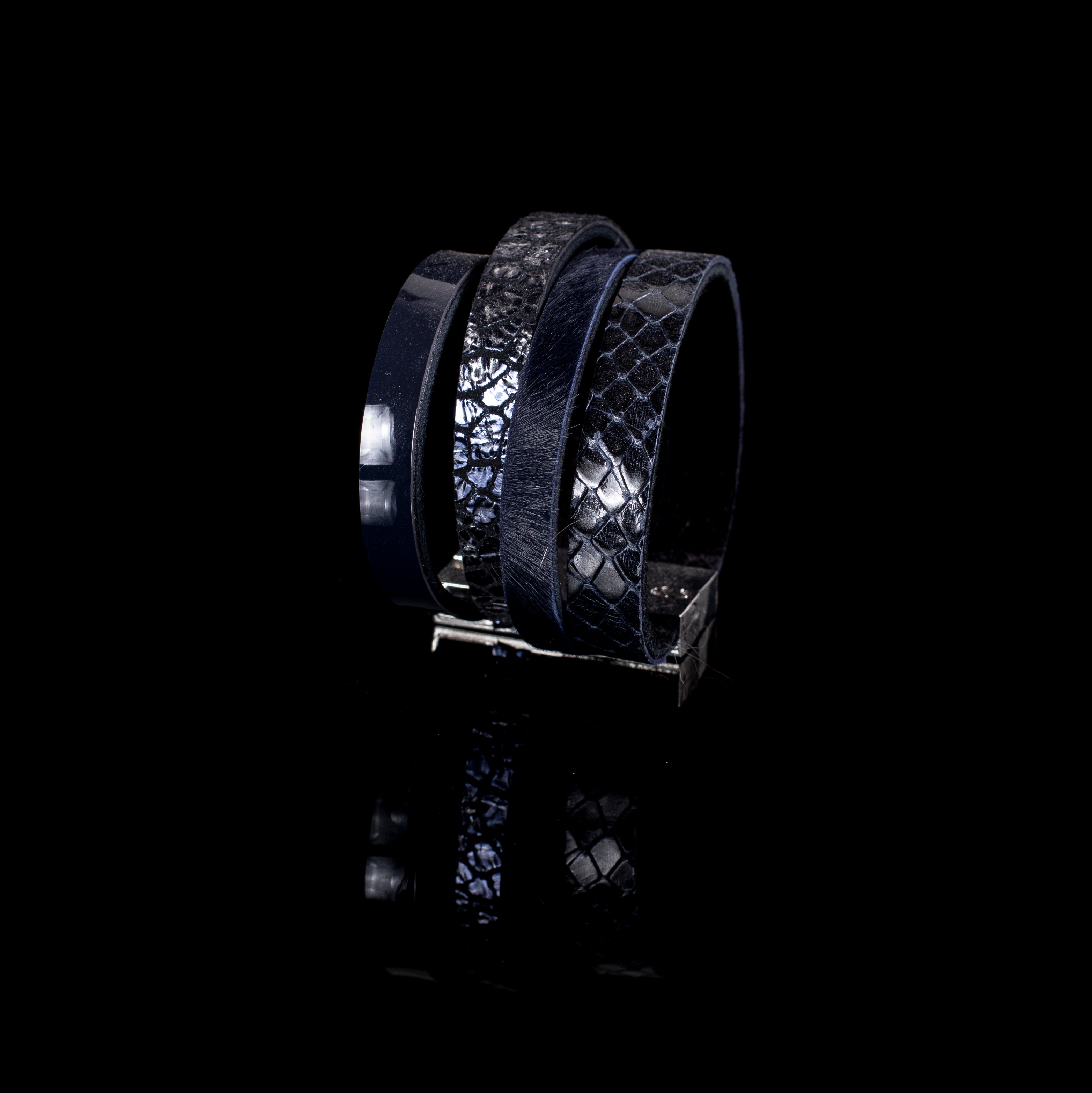 Black leather layered cuff bracelet with python textured straps and glossy band detail, handcrafted minimalist statement bracelet for women by THE DARK