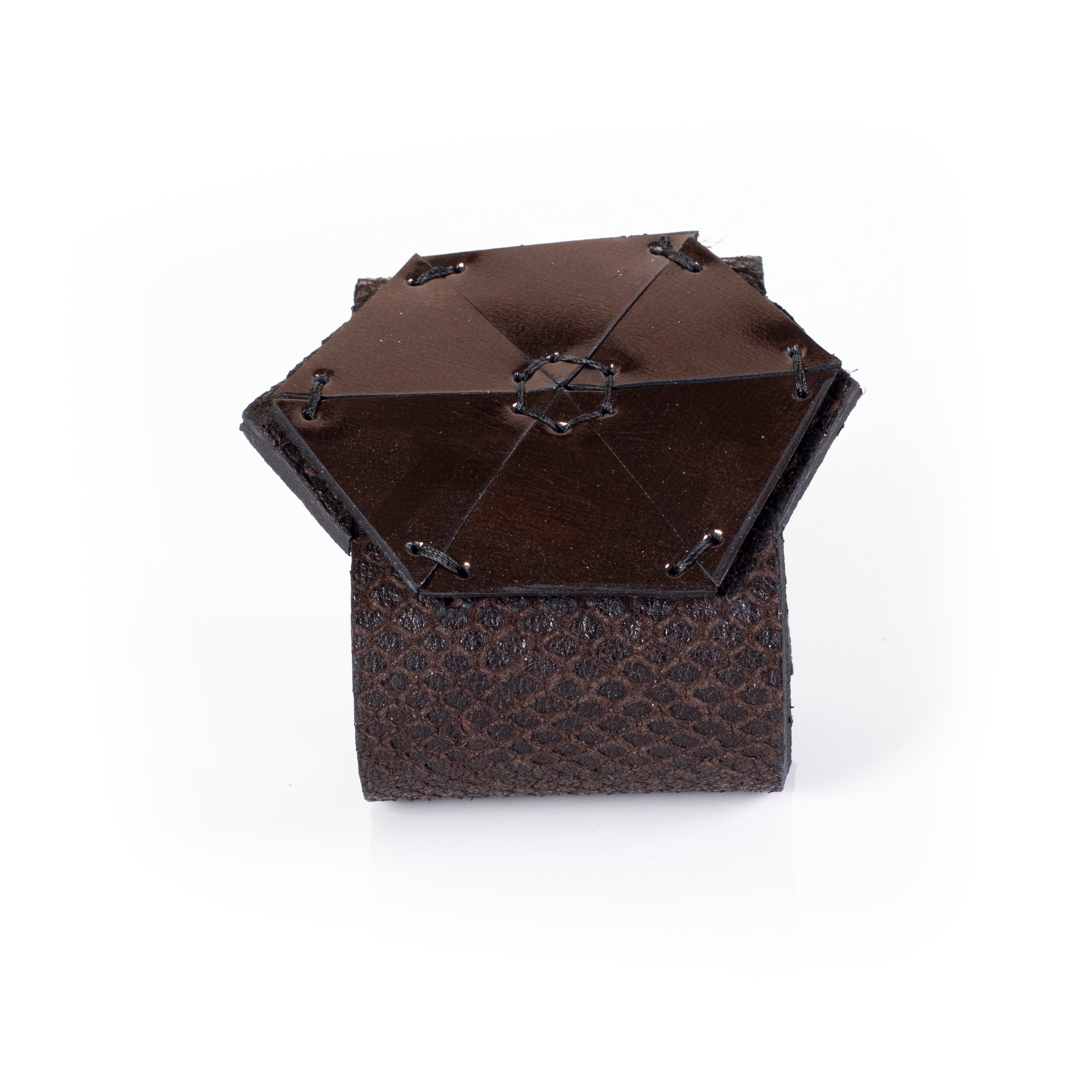 Brown leather cuff bracelet with geometric stitched panel and hexagon detail, handcrafted wide statement bracelet for women