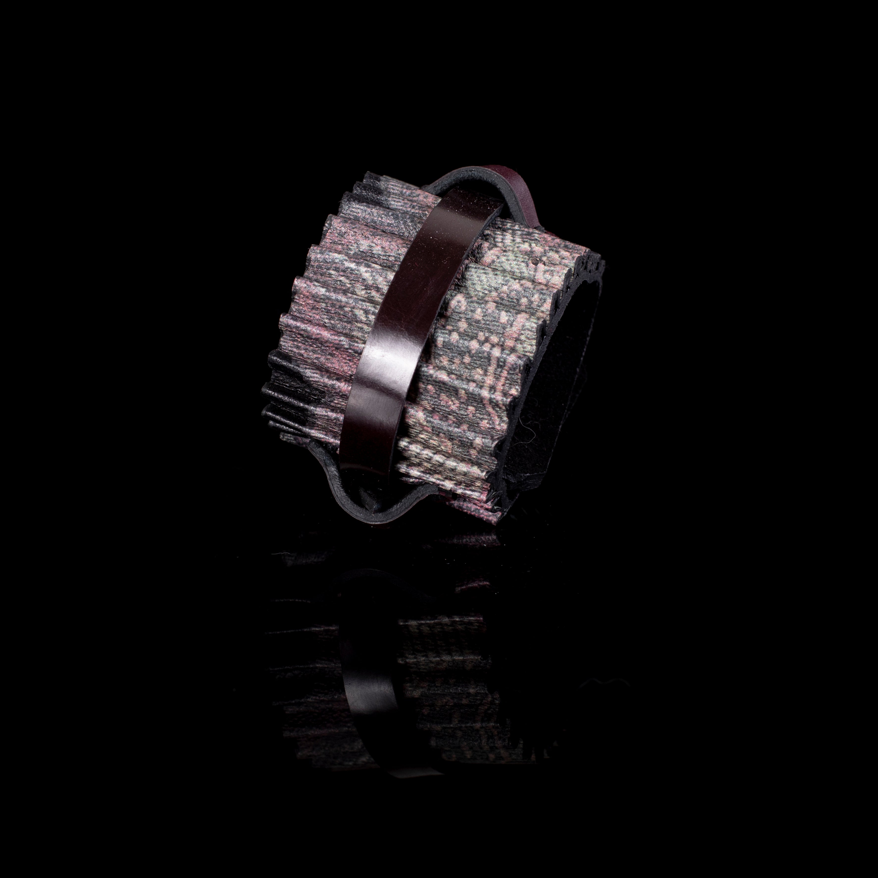 Brown leather cuff bracelet with pleated fabric texture and central strap, handcrafted wide statement bracelet for women