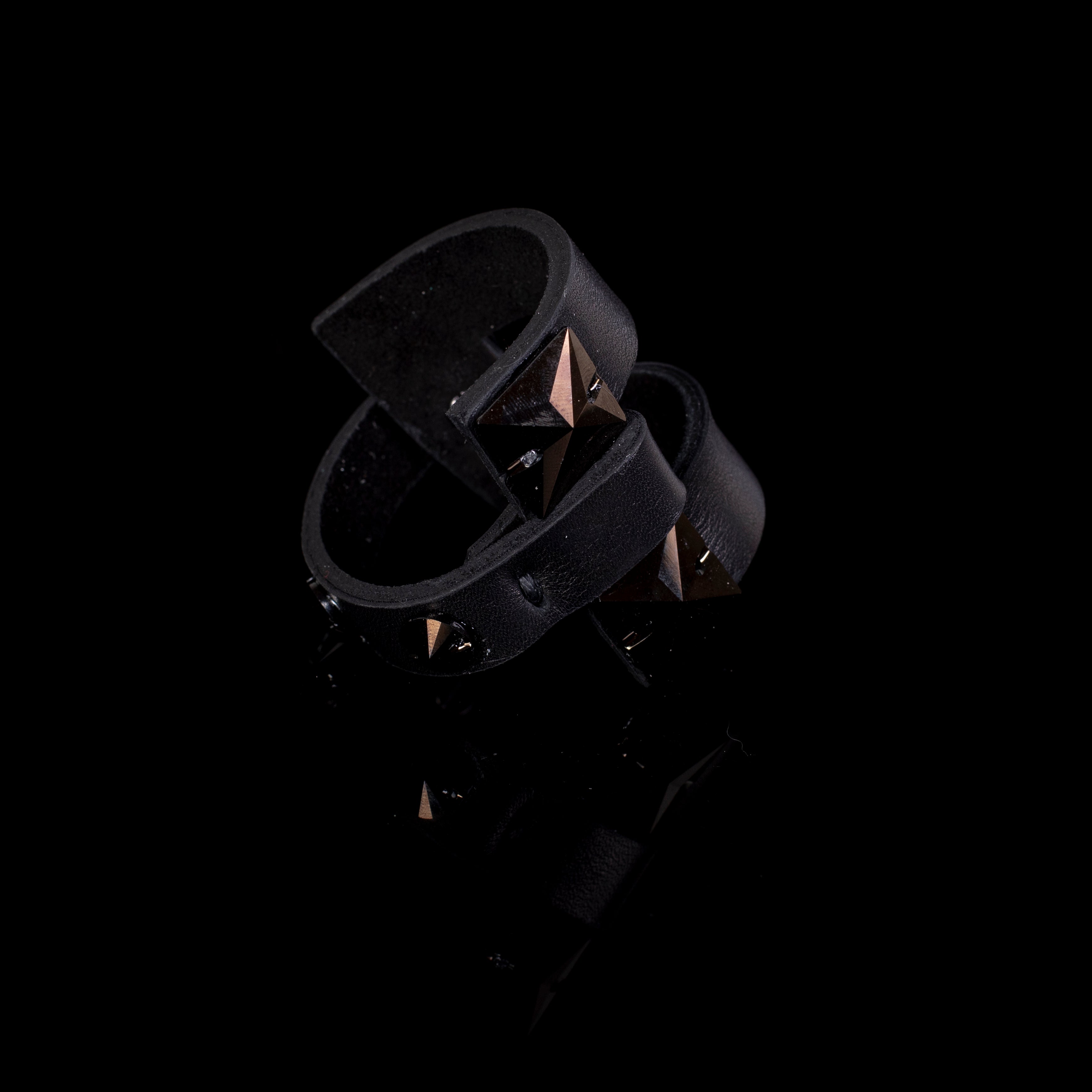 Black leather cuff bracelet with large pyramid studs and double strap design, handcrafted bold statement bracelet for women
