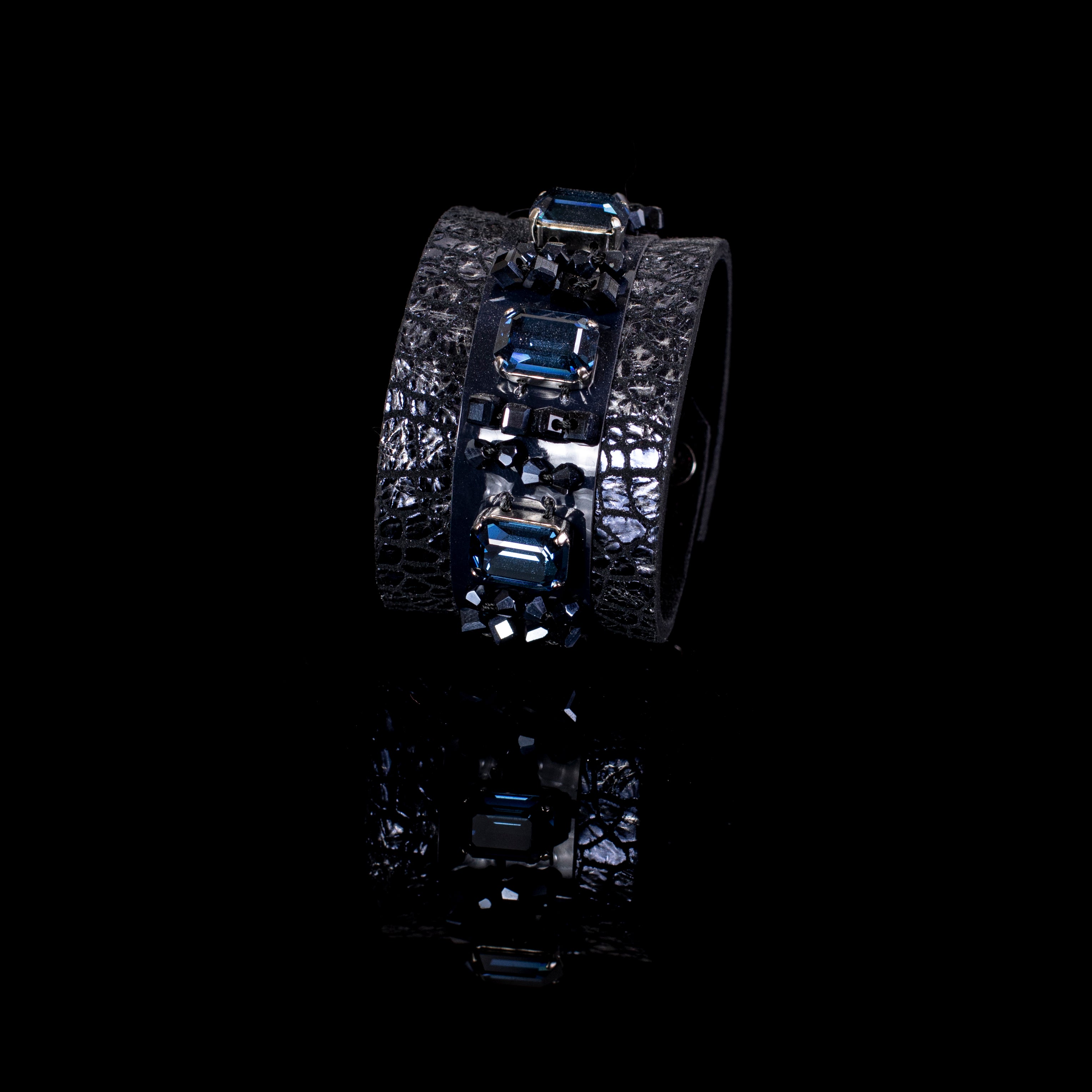 Black python leather cuff bracelet with blue faceted crystals and black bead clusters, handcrafted luxury statement bracelet for women by THE DARK