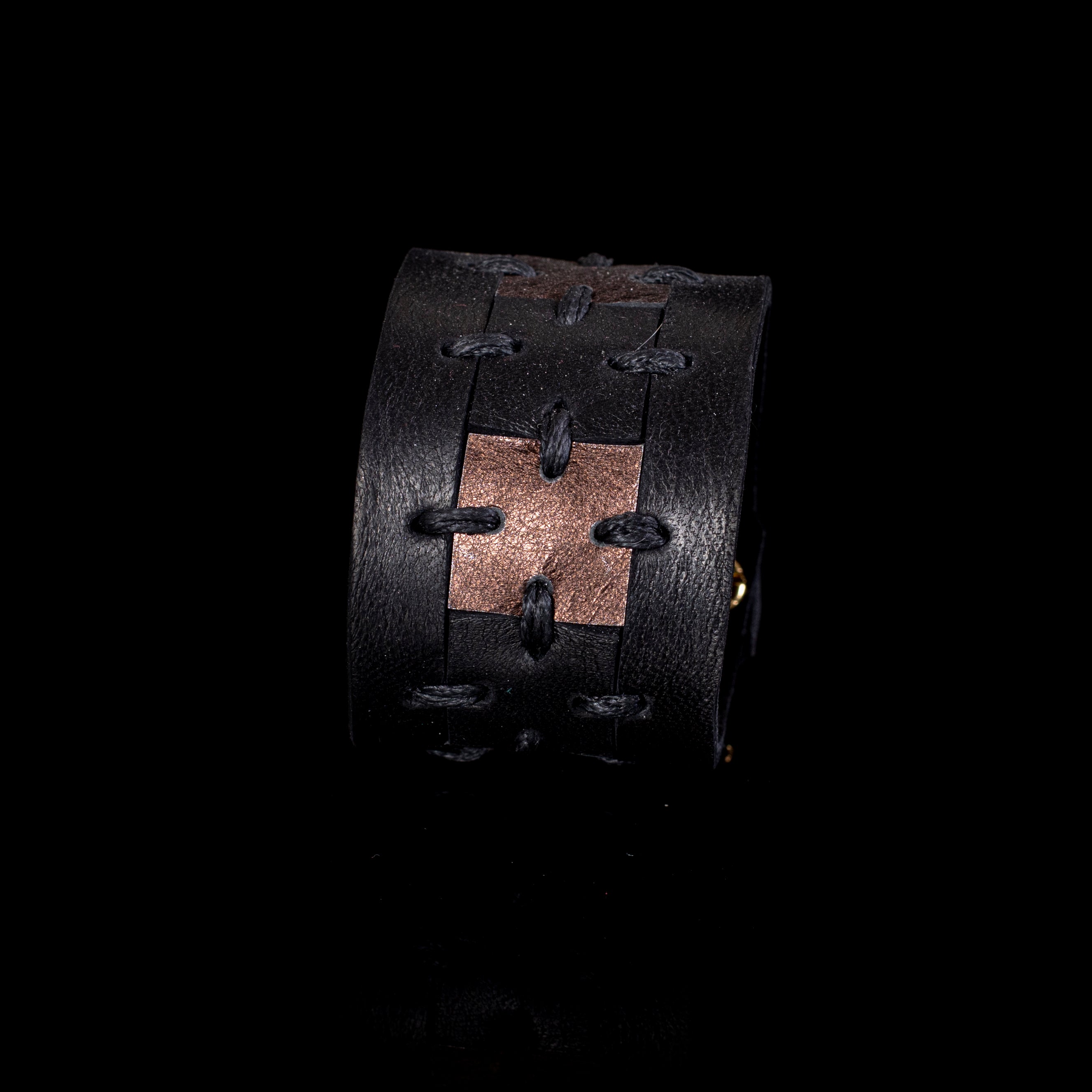 Black leather cuff bracelet with bronze center panel and visible hand stitching, handcrafted wide statement bracelet for women by THE DARK
