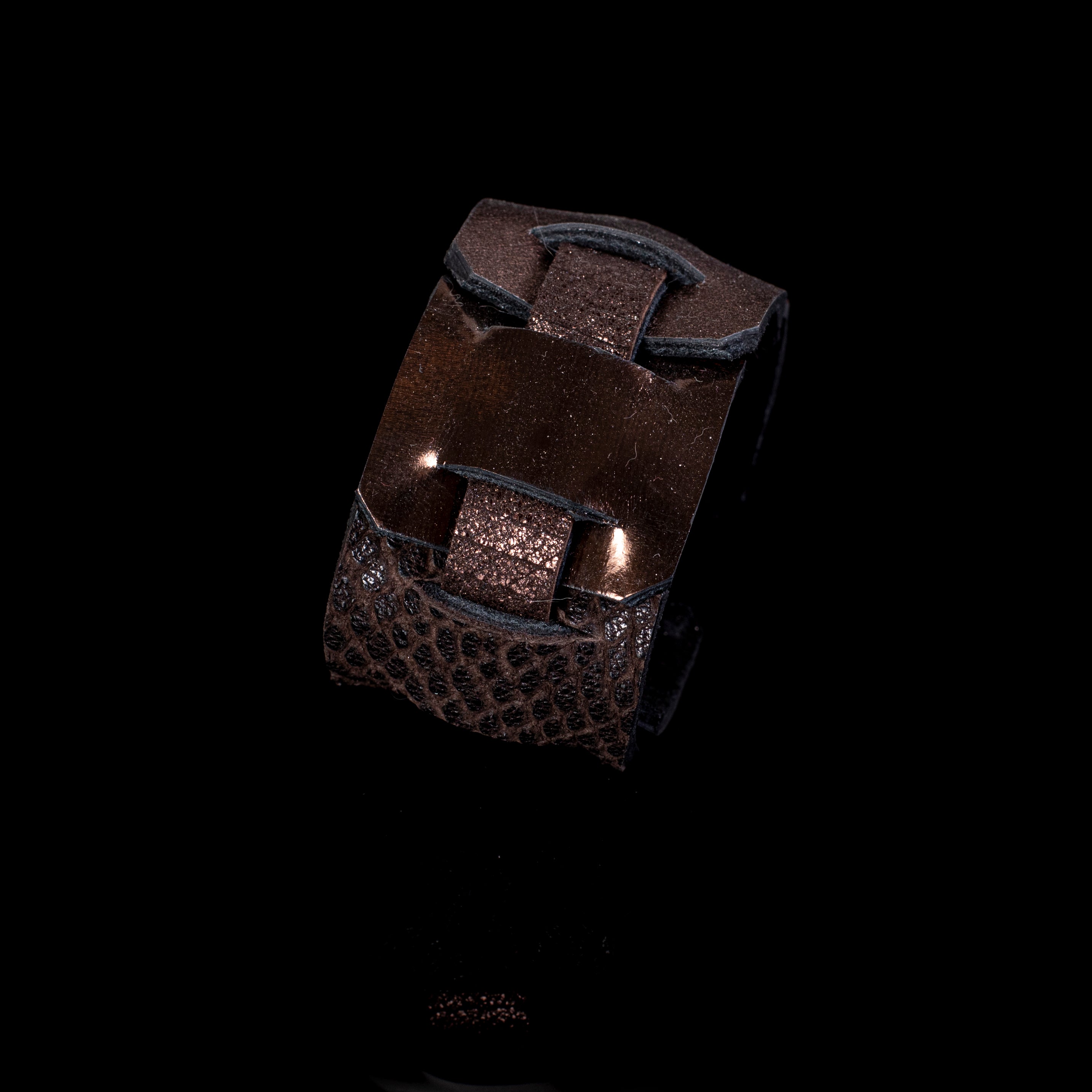 Black and bronze leather cuff bracelet with layered panels and textured leather detail, handcrafted wide statement bracelet for women