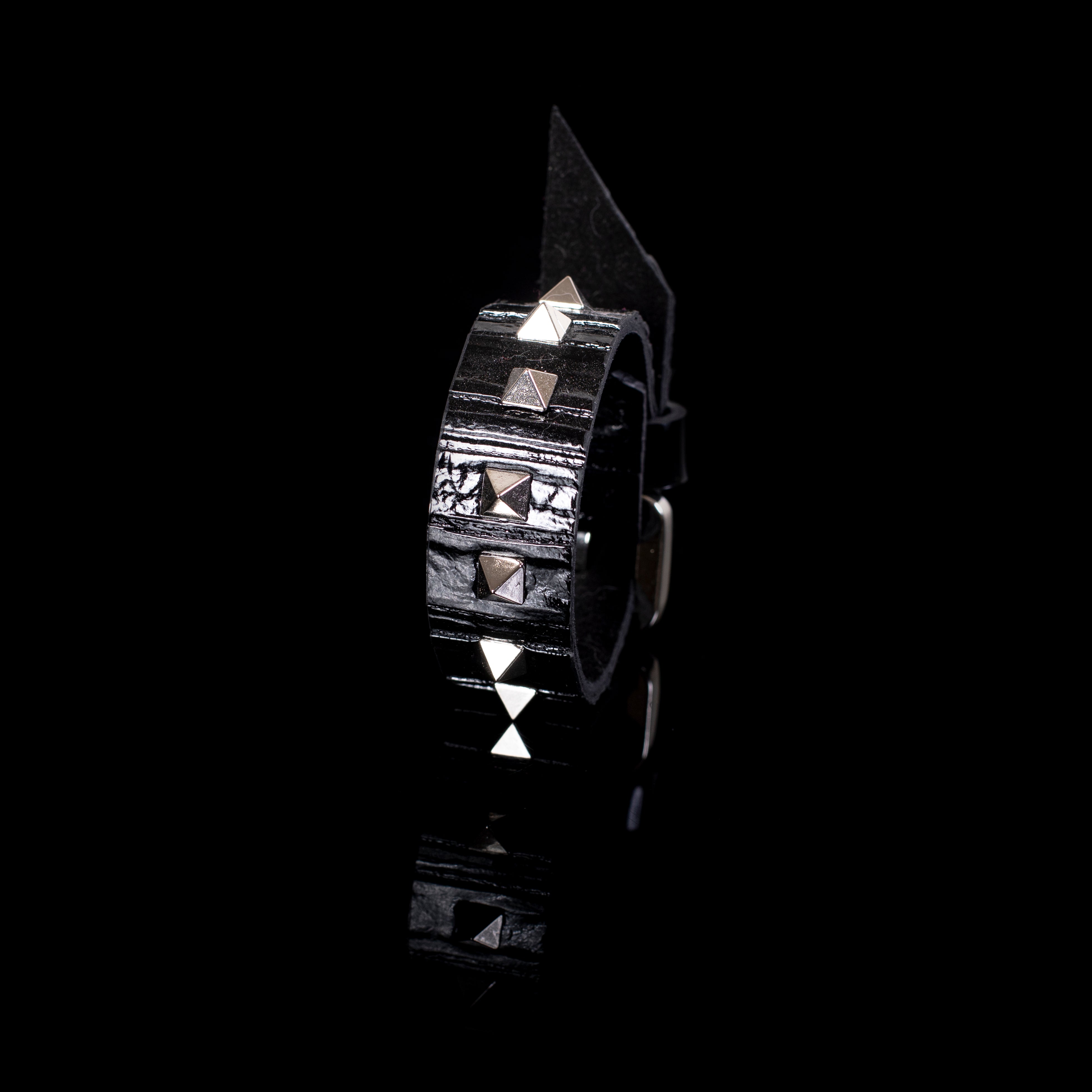 Black patent leather cuff bracelet with pyramid studs and pointed spike detail, wide handcrafted statement bracelet for women by THE DARK