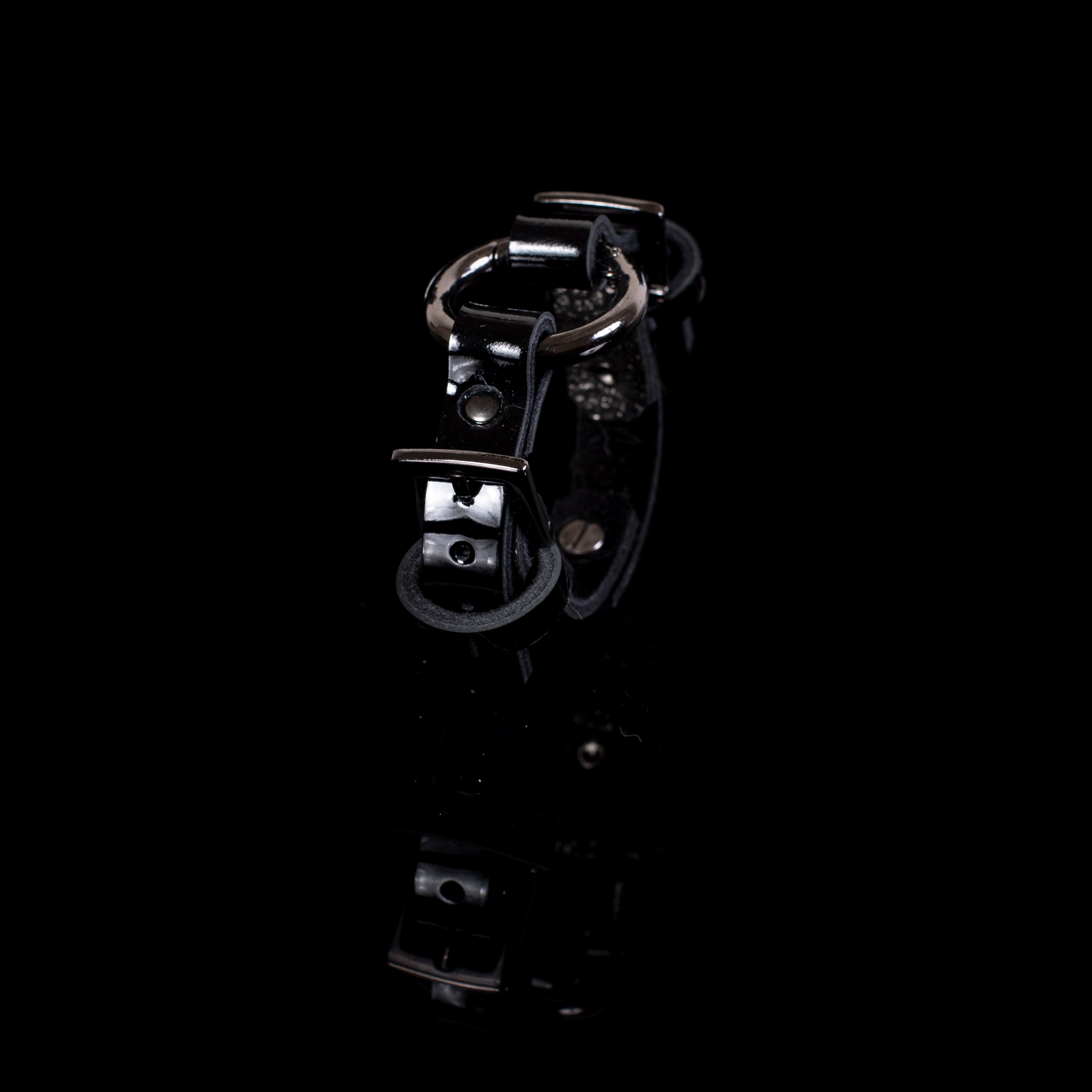 Brown leather cuff bracelet with gold bar hardware and crystal detail, handcrafted wide statement bracelet for women