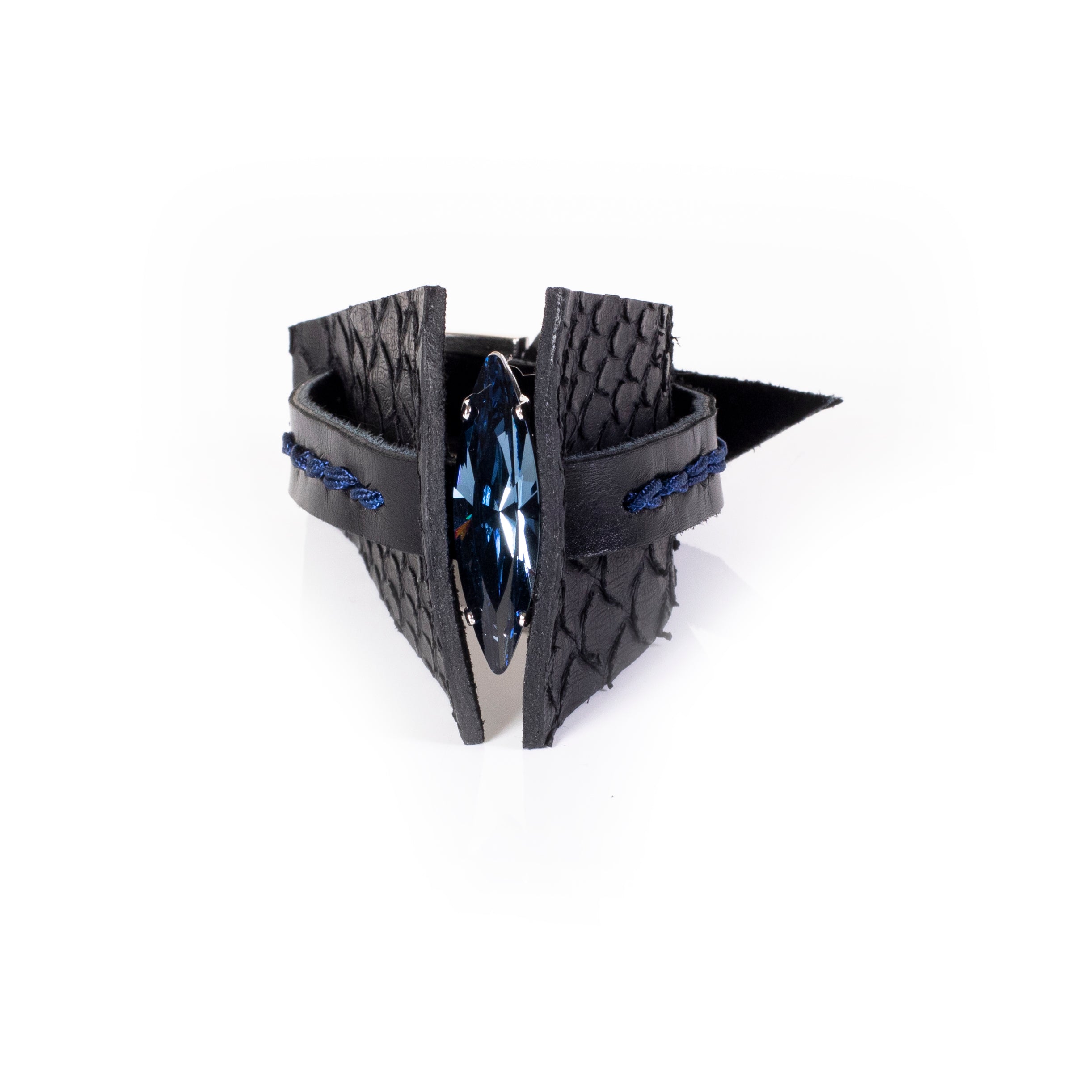 Black textured leather cuff bracelet with sculptural layered design, blue braided detail and crystal accent, handcrafted statement bracelet for women by THE DARK