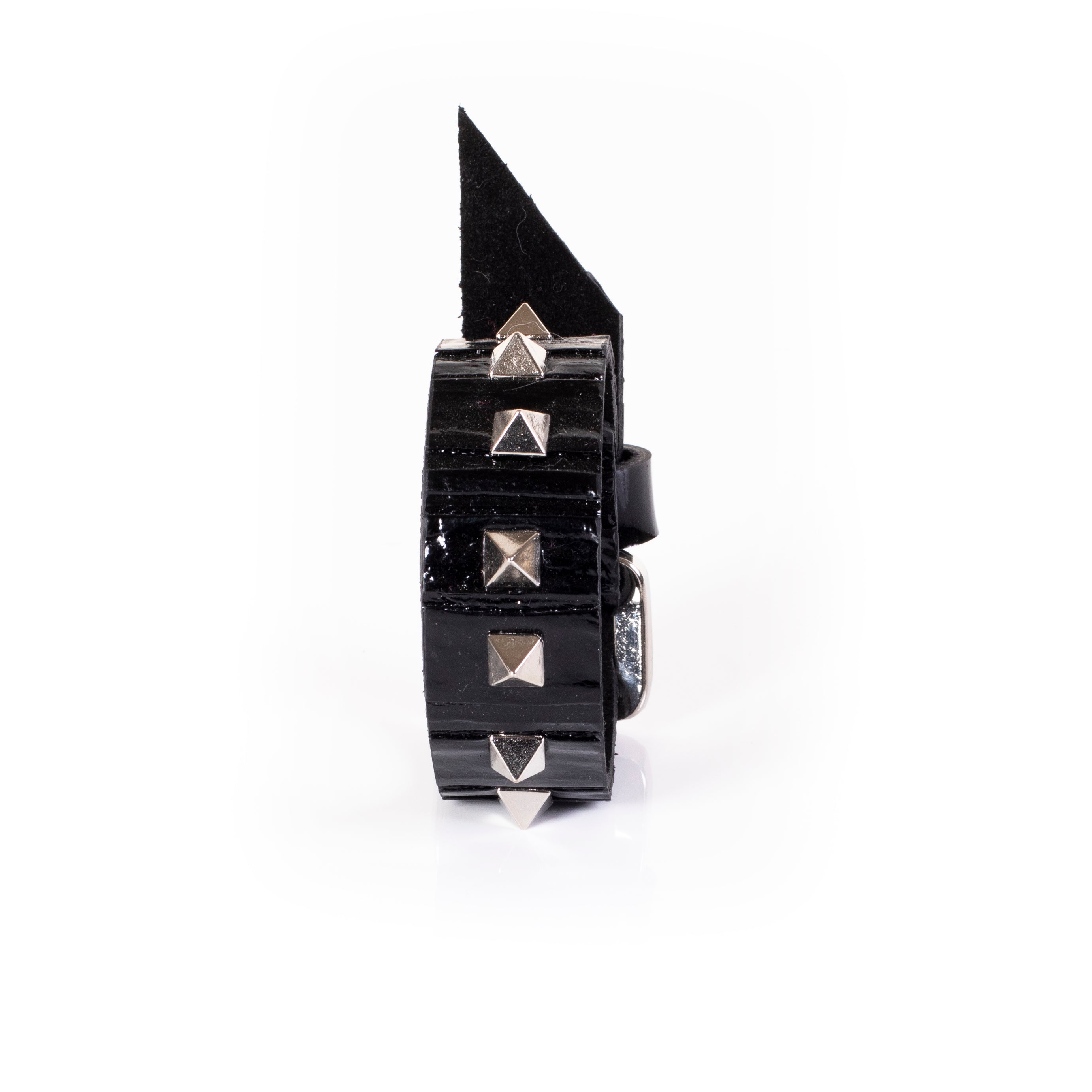 Black patent leather cuff bracelet with pyramid studs and pointed spike detail, wide handcrafted statement bracelet for women by THE DARK