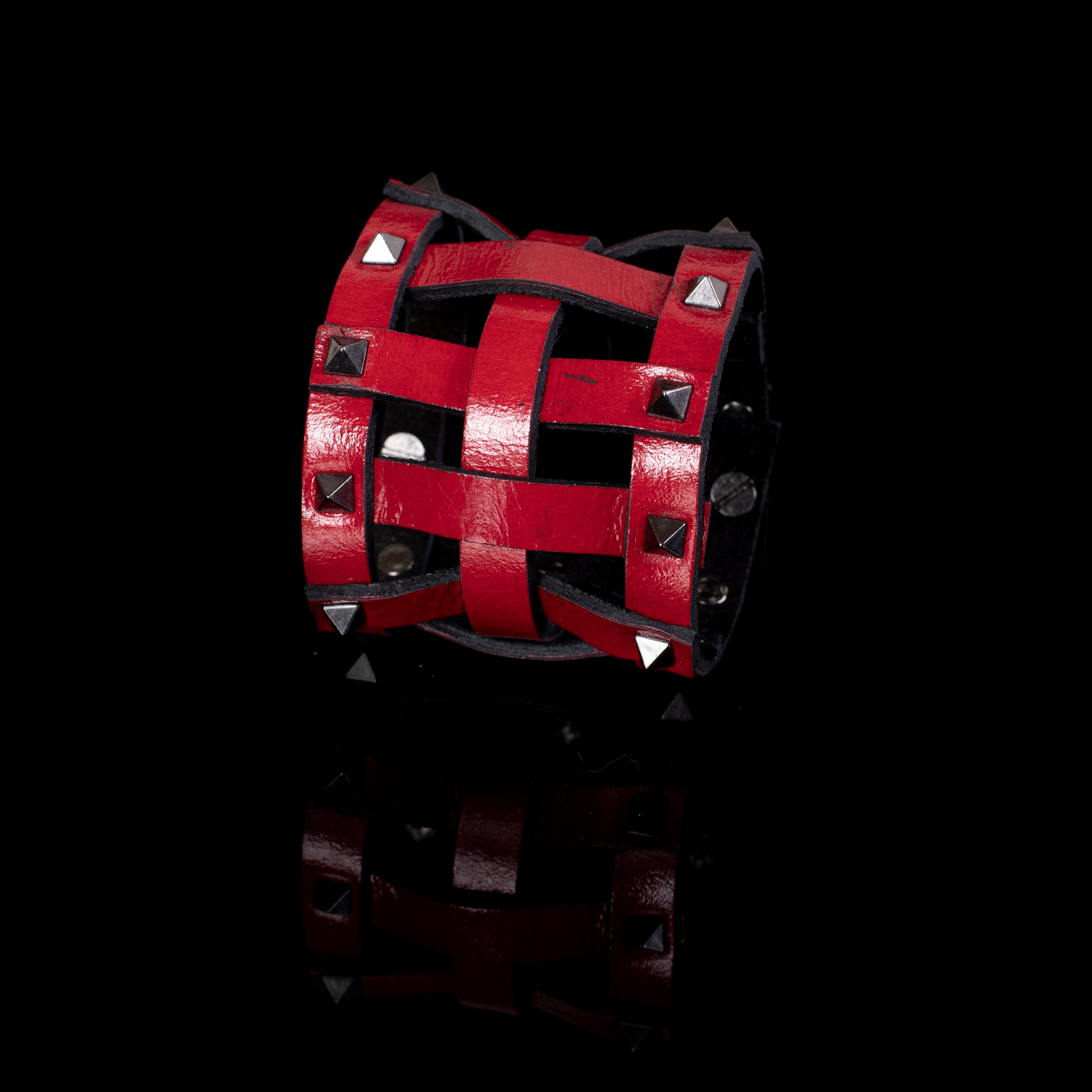 Red leather cage cuff bracelet with silver pyramid studs and black interior, handcrafted wide statement bracelet for women by THE DARK