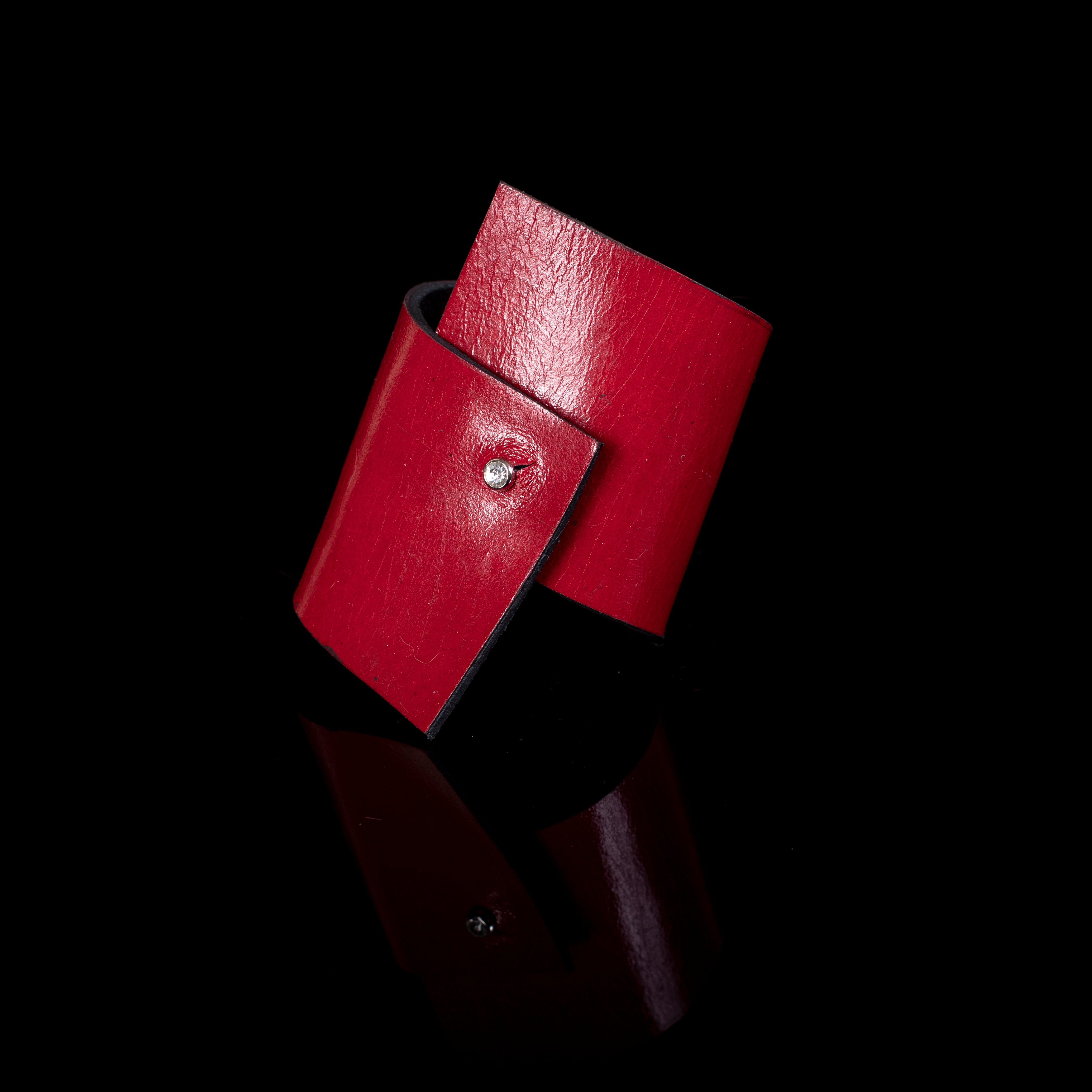 Red leather cuff bracelet with layered panel design and stud detail, handcrafted wide statement bracelet for women