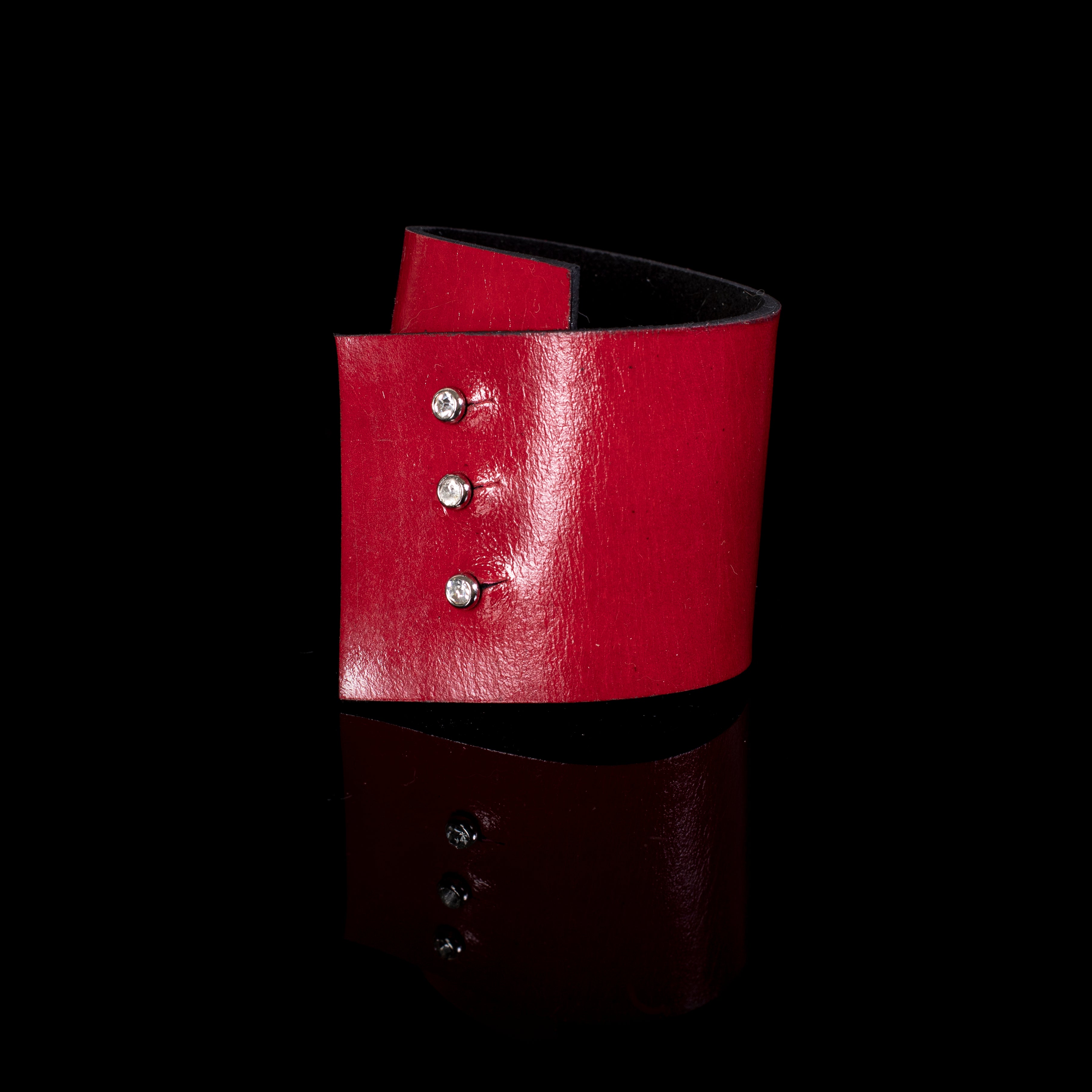 Red leather cuff bracelet with minimalist flap detail and metal studs, handcrafted wide statement bracelet for women