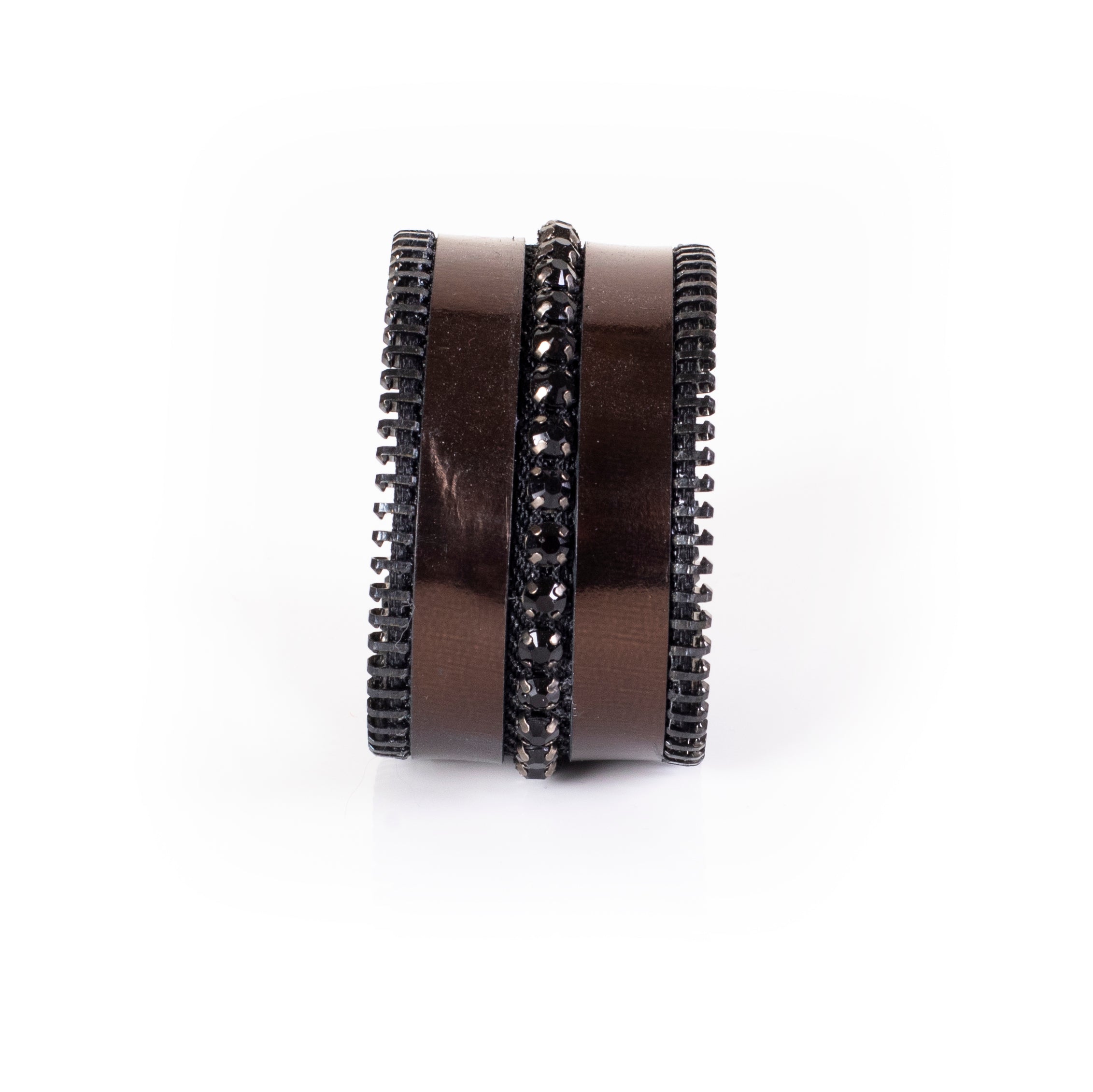 Wide black leather cuff bracelet with metallic bronze bands, black crystal strip and zipper edge detail, handcrafted statement bracelet for women