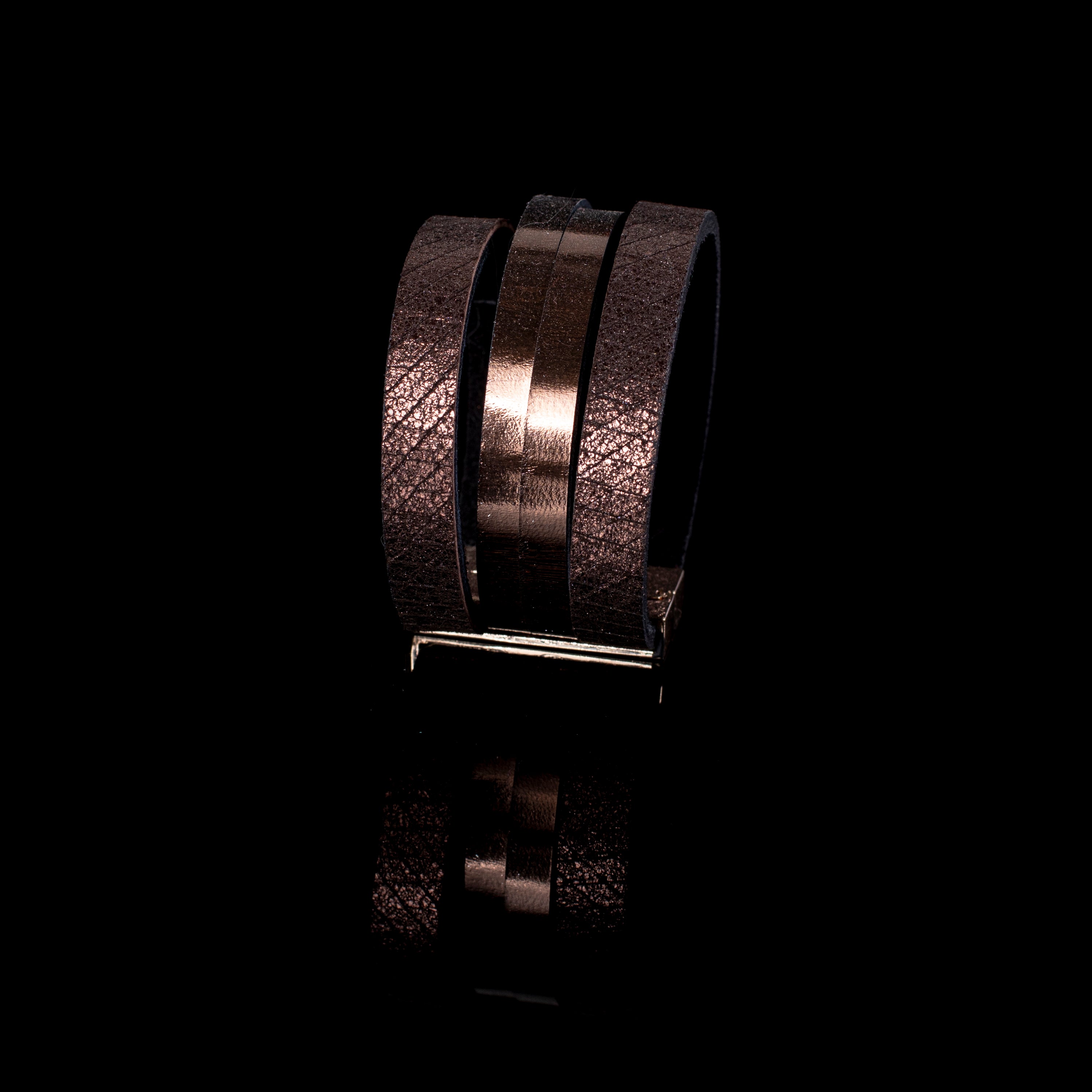 brown leather wrap bracelet with multiple layered straps and metallic bronze finish minimalist design