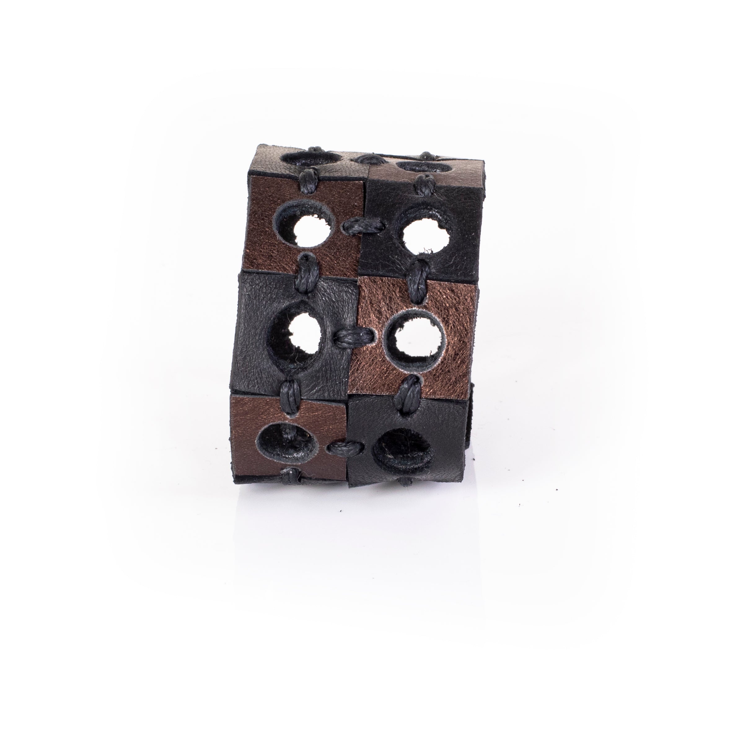 Black and bronze leather patchwork cuff bracelet with circular cutouts and hand stitching, handcrafted wide statement bracelet for women by THE DARK
