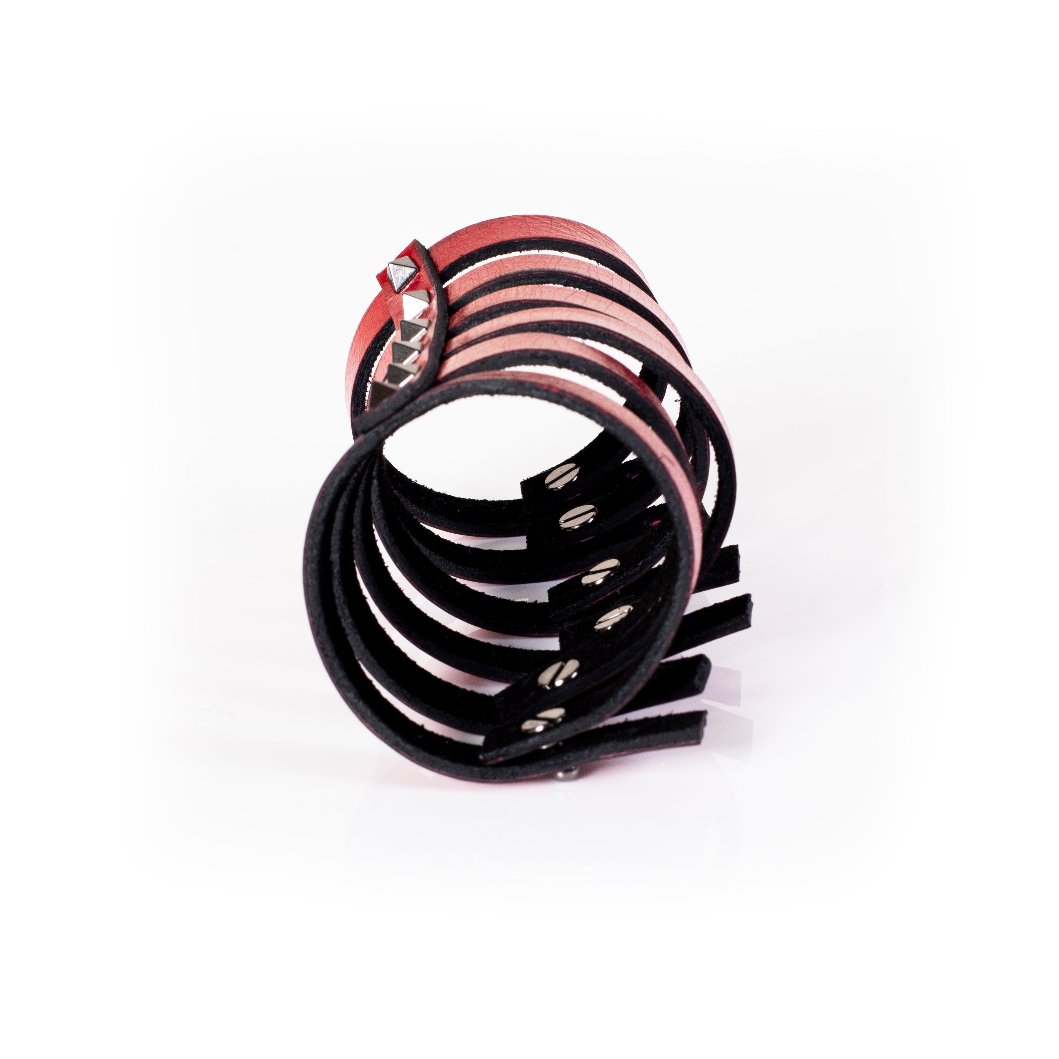Red leather multi-strap cuff bracelet with silver pyramid studs and black interior lining, handcrafted structured statement bracelet for women by THE DARK