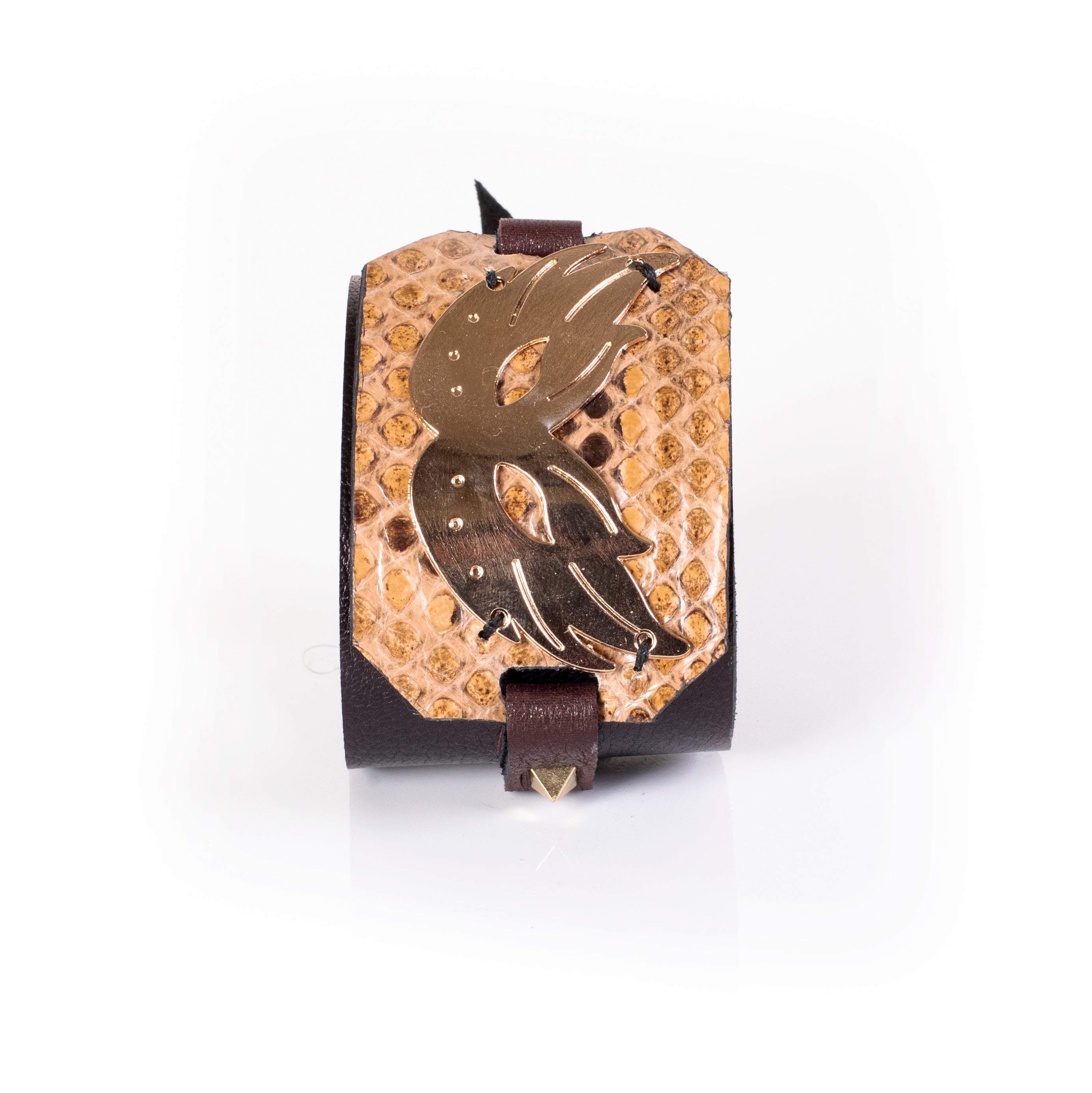 wide python leather cuff bracelet with sculptural gold plate centerpiece bold statement design