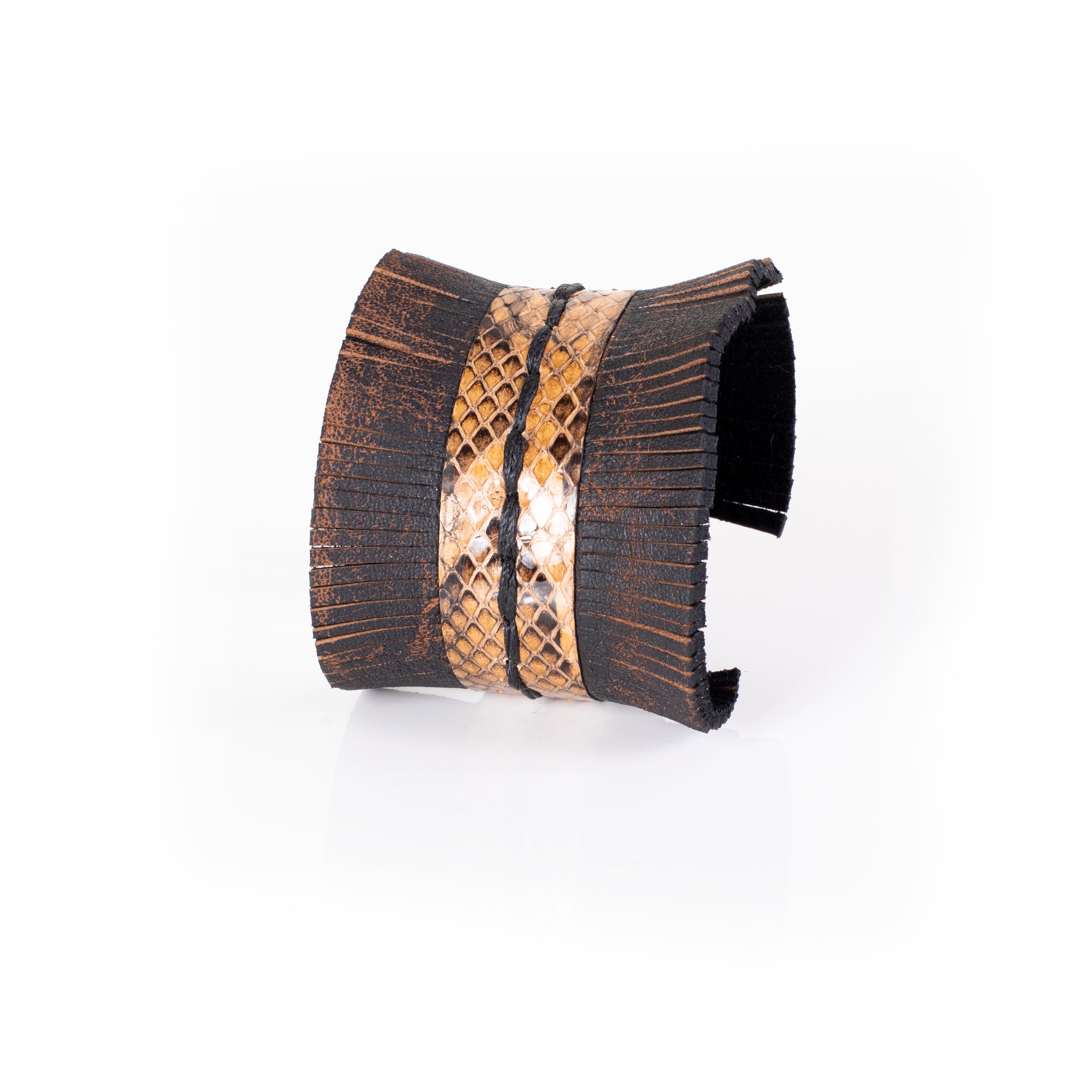 Brown leather wide cuff bracelet with central python textured panel, fringe edges and hand stitching, handcrafted statement bracelet for women by THE DARK
