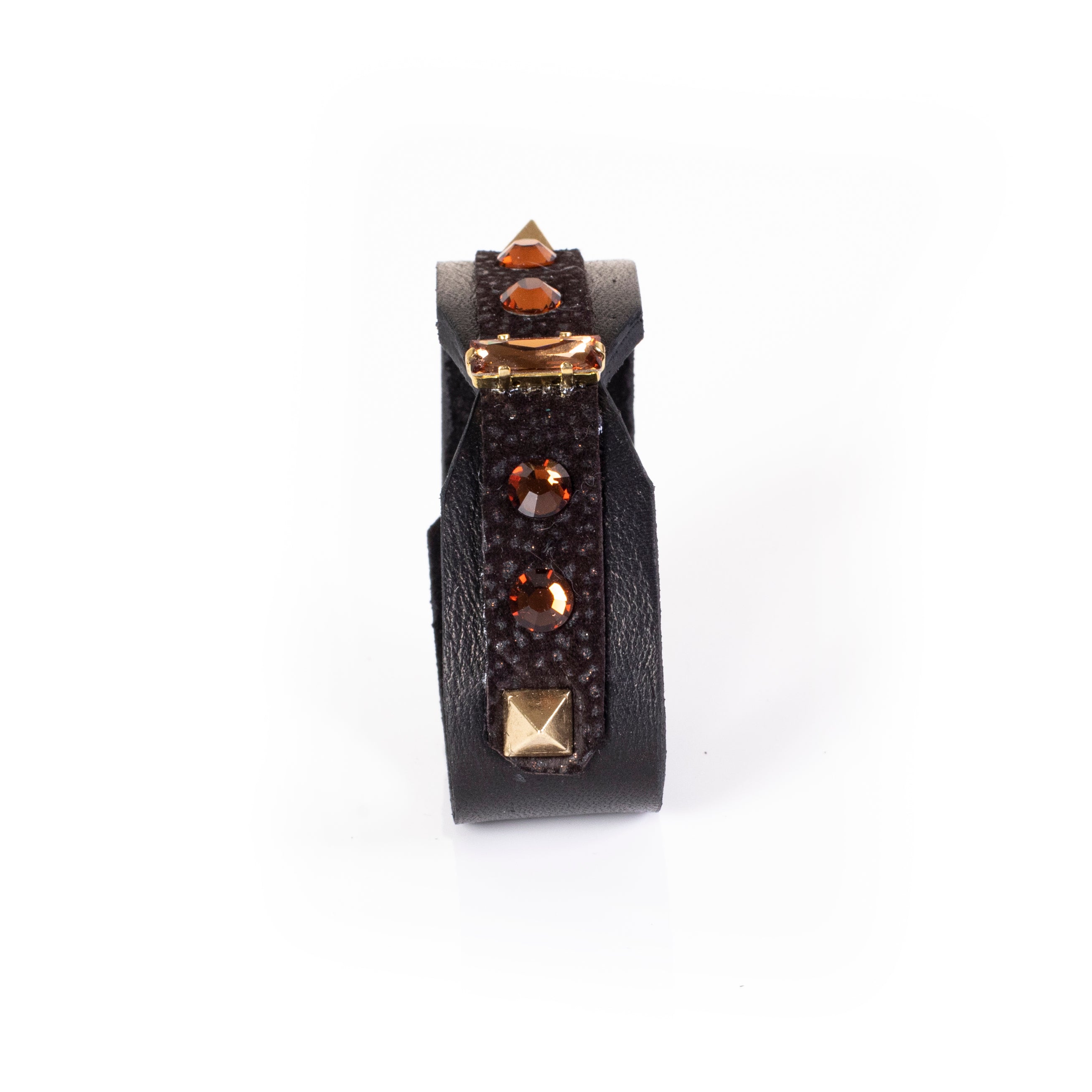 Black textured leather cuff bracelet with amber crystal stones and gold bar detail, wide handcrafted statement bracelet for women
