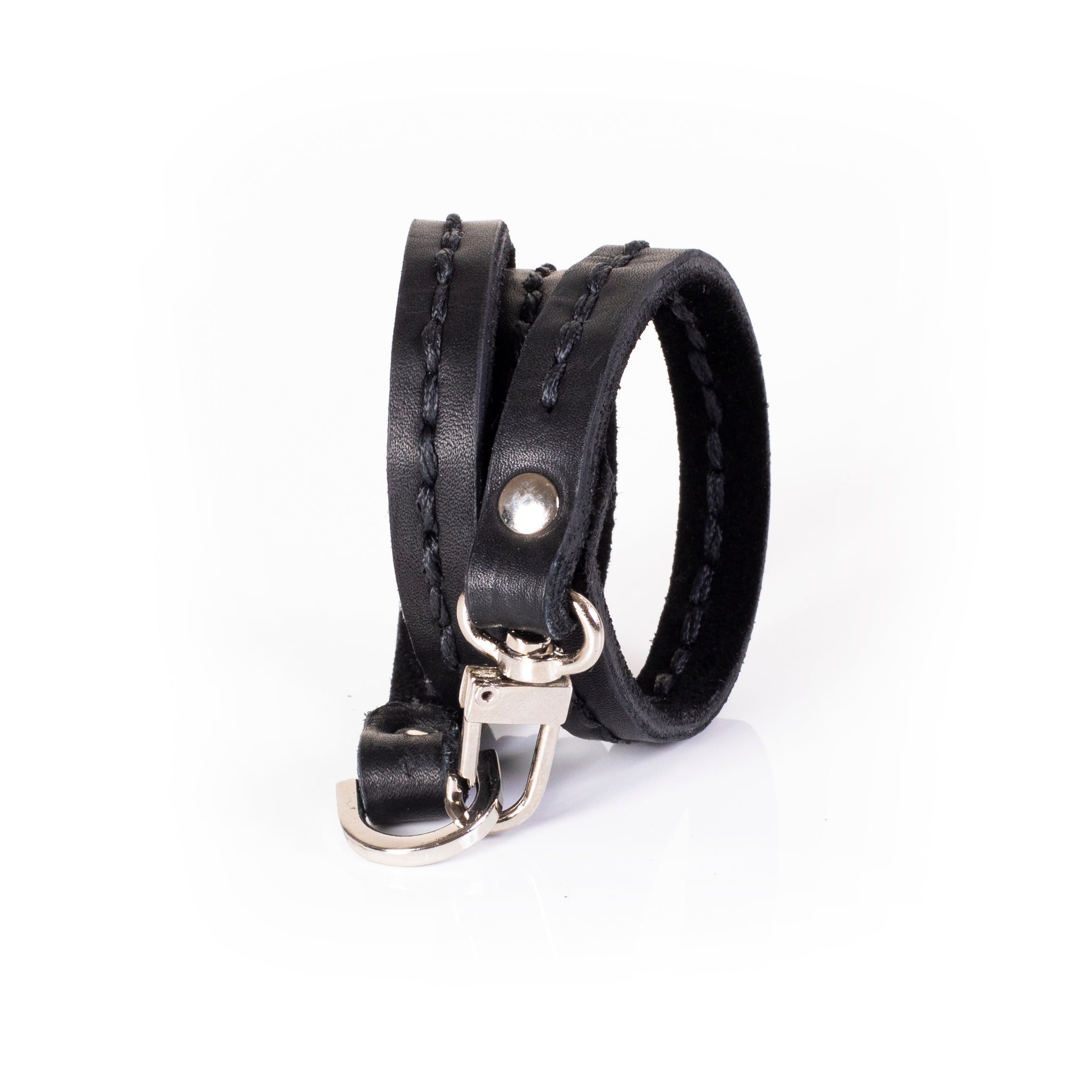 Black leather triple wrap bracelet with visible hand stitching and layered slim straps, handcrafted minimalist bracelet for women by THE DARK